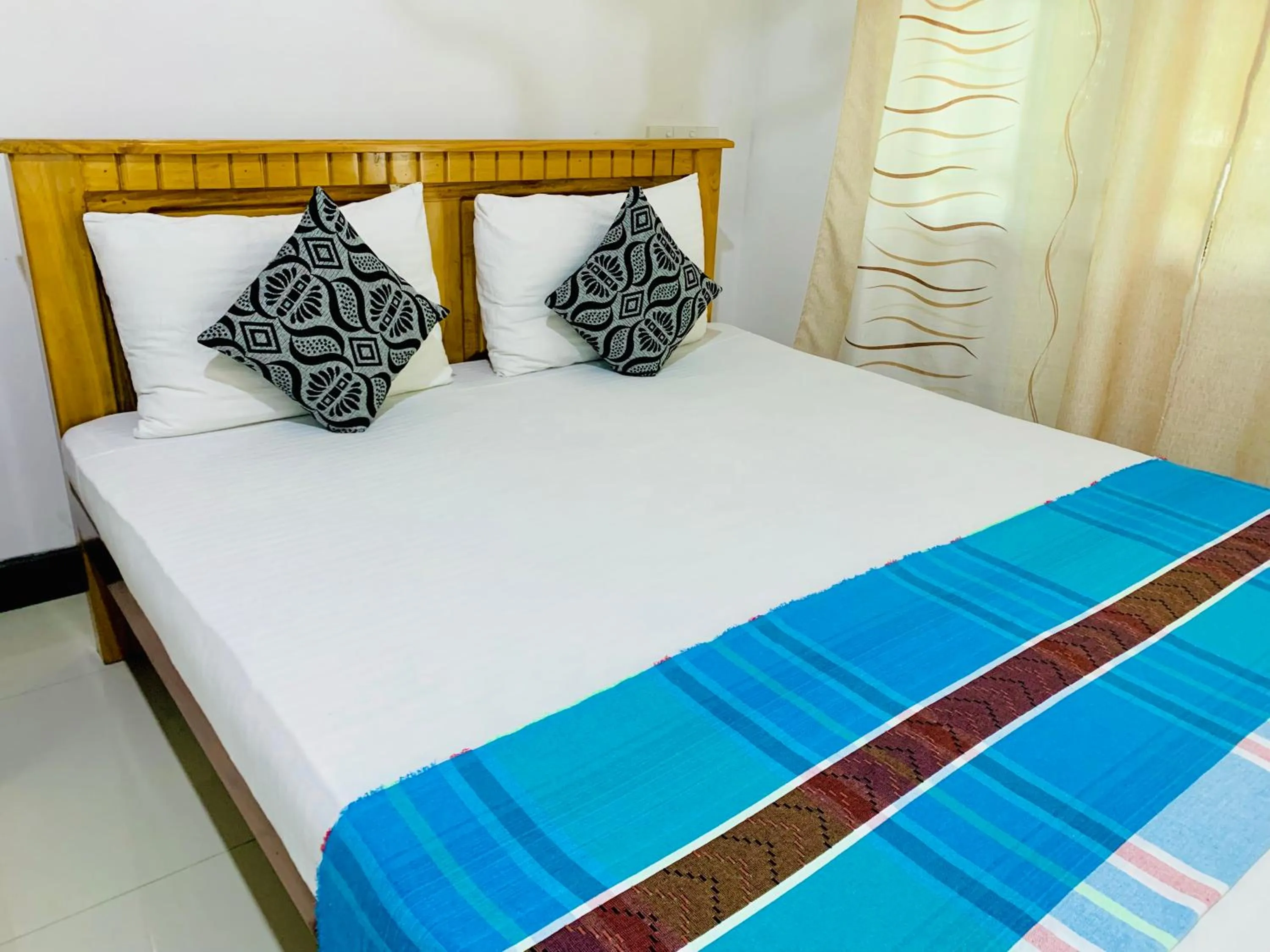 Bed in Rich Resort & Restaurant