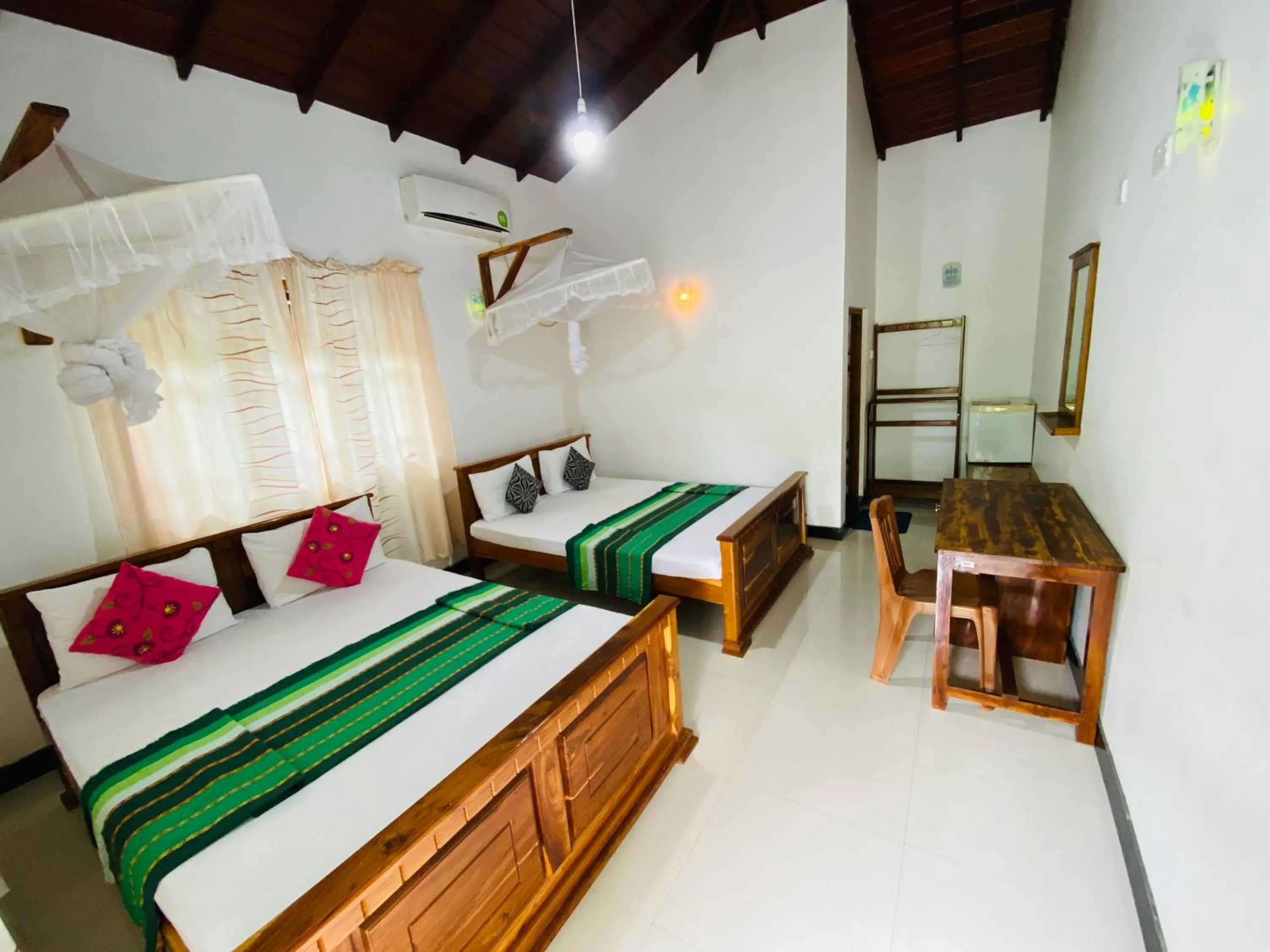 Bed in Rich Resort & Restaurant