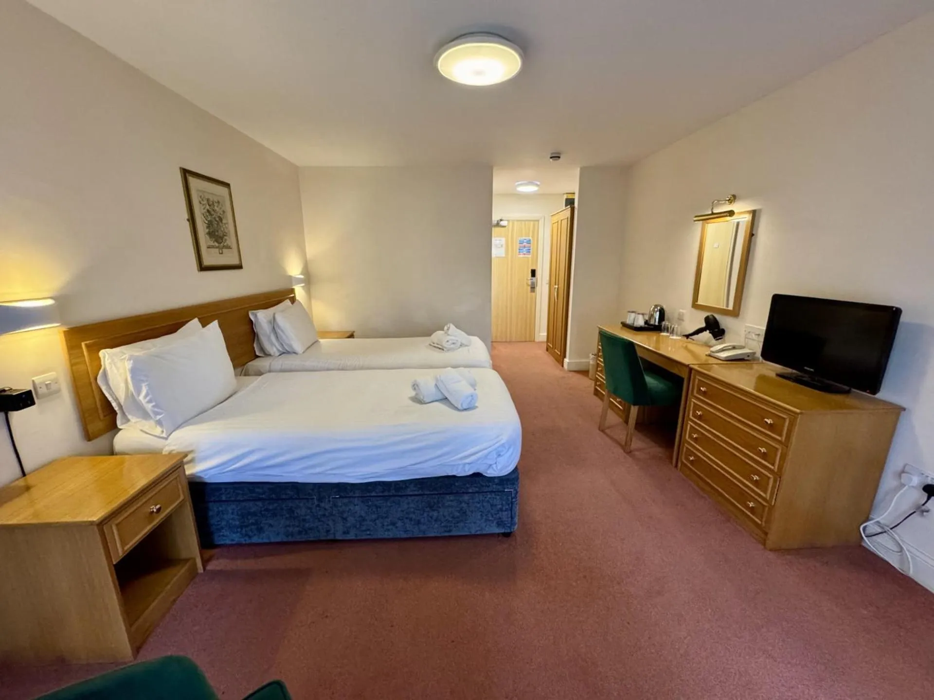 Bed in Louisa Lodge & Purbeck House Hotel
