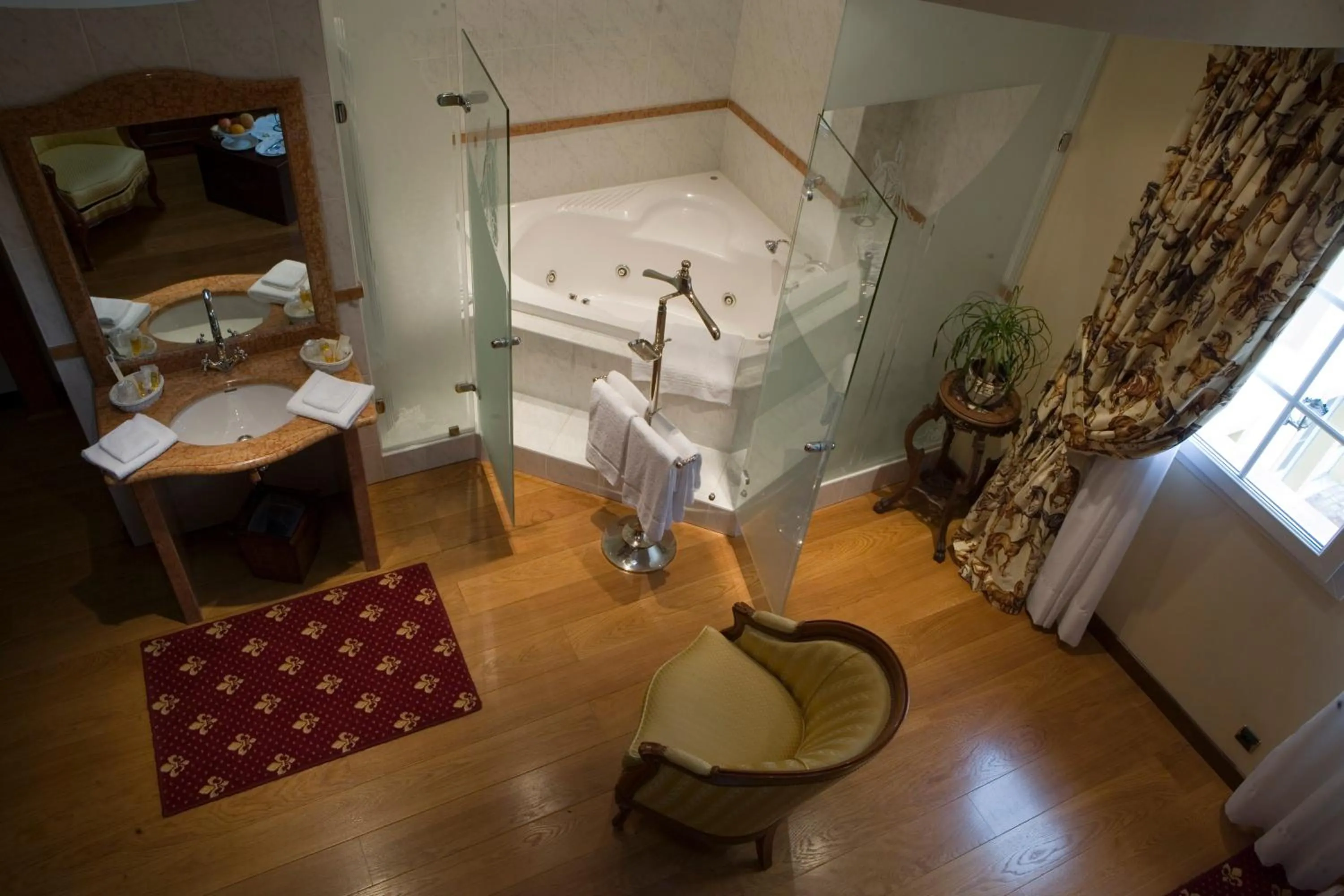 Bedroom in Hôtel du Domaine de La Grange de Condé