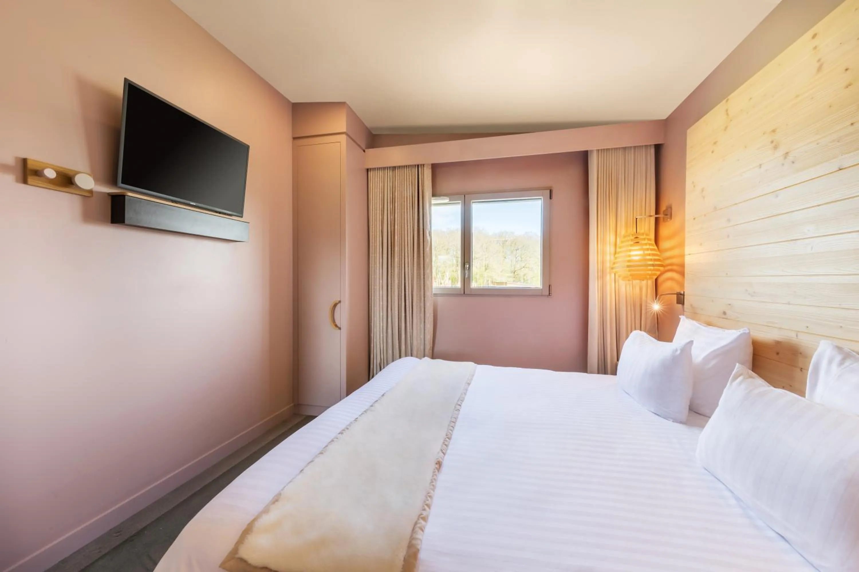 Communal lounge/ TV room, Bed in Center Parcs Villages Nature Paris