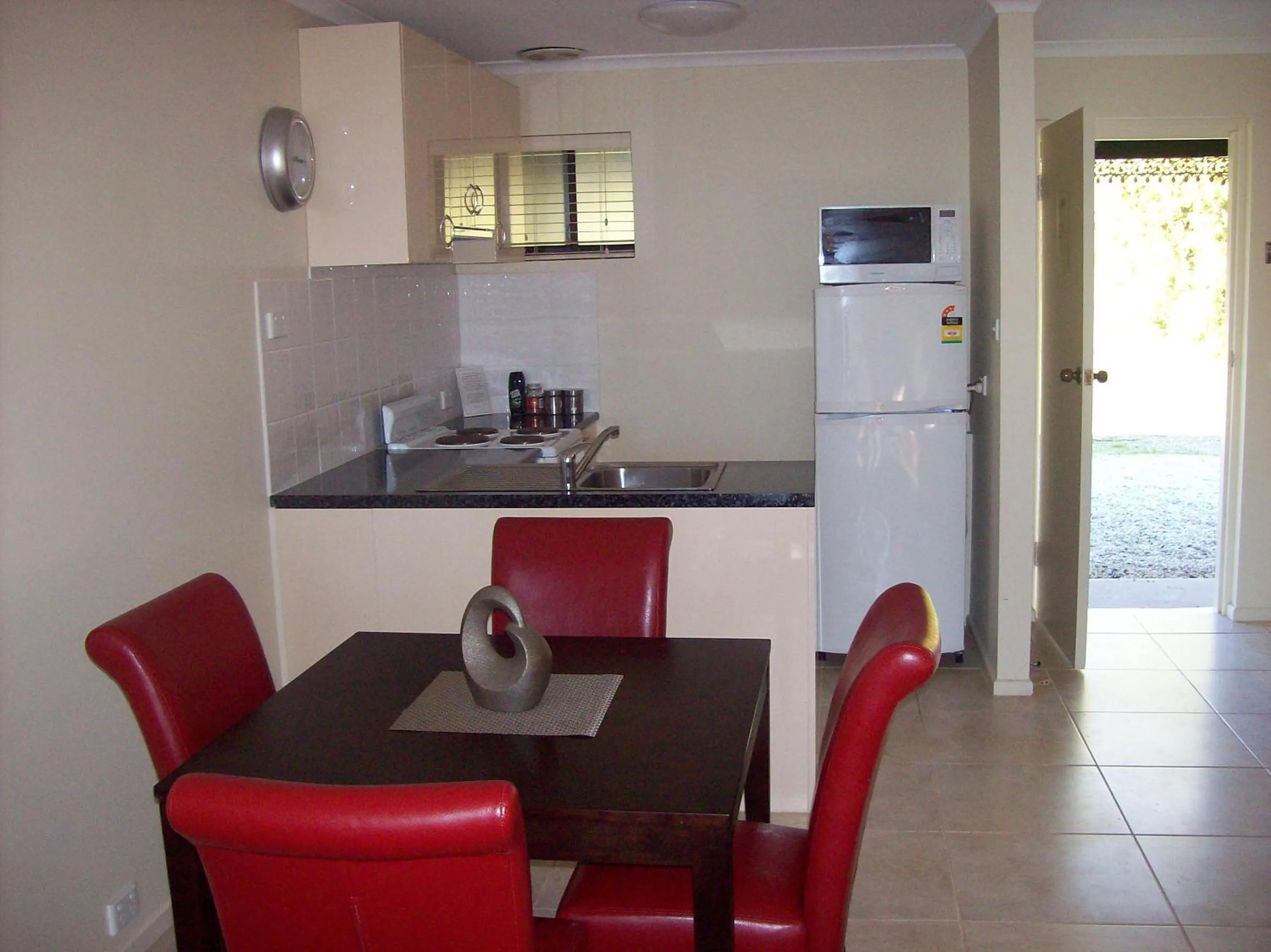 Kitchen or kitchenette in Colonial Inn Guest Rooms