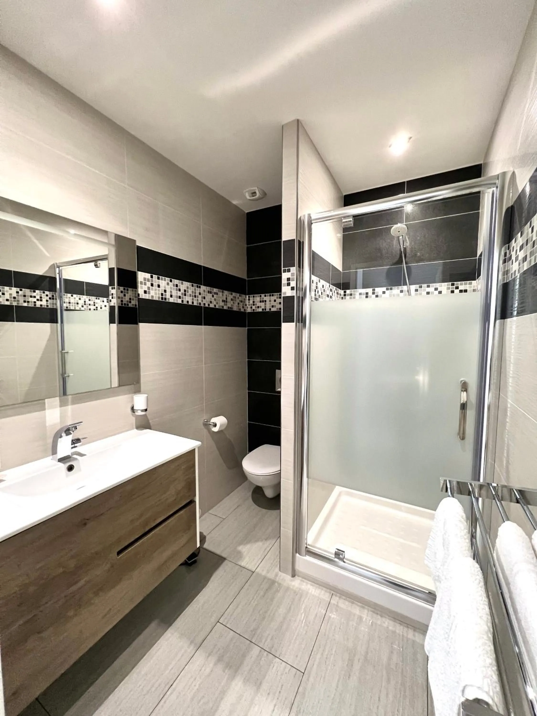 Shower in Les Alizés Résidence & Spa