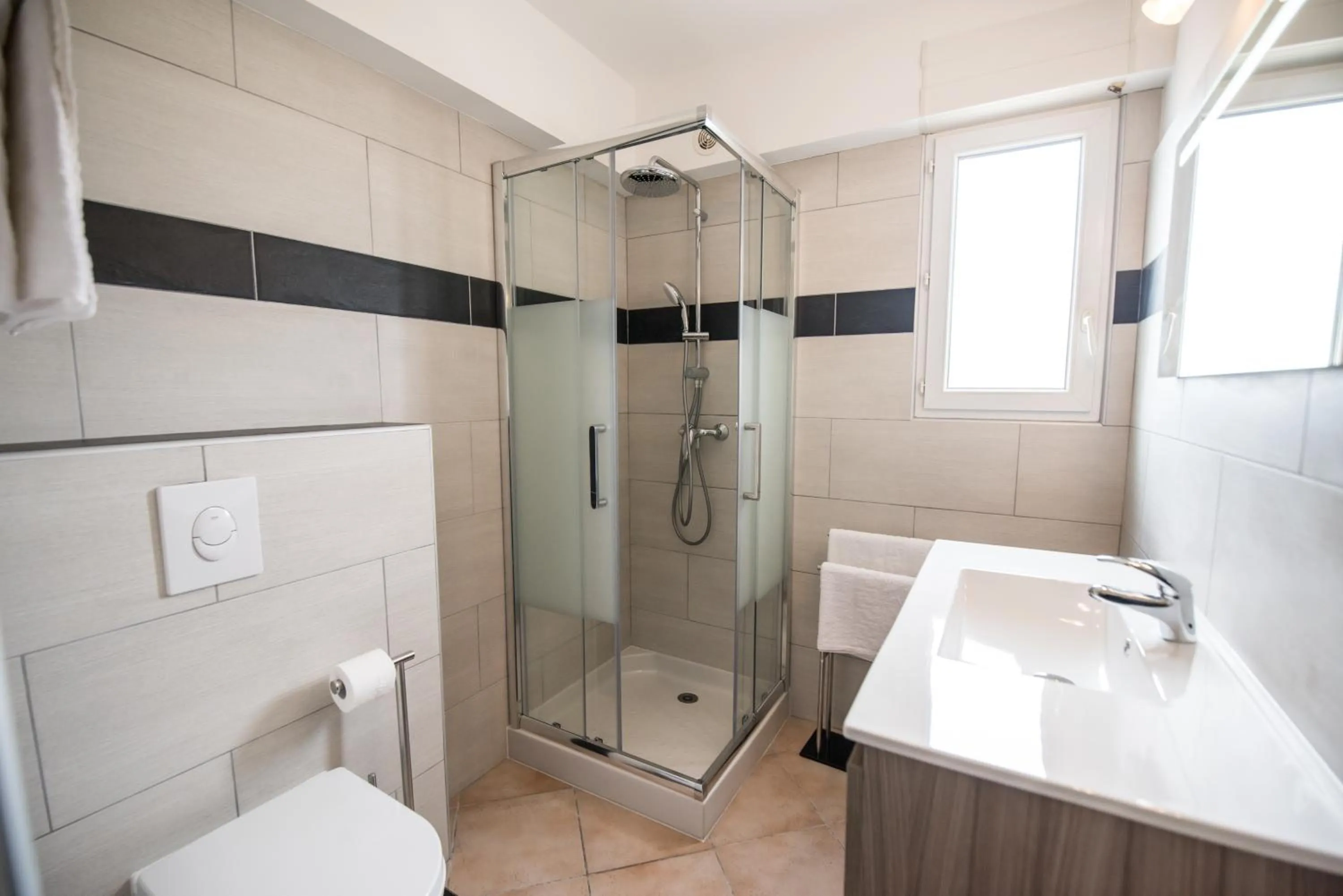 Shower in Les Alizés Résidence & Spa