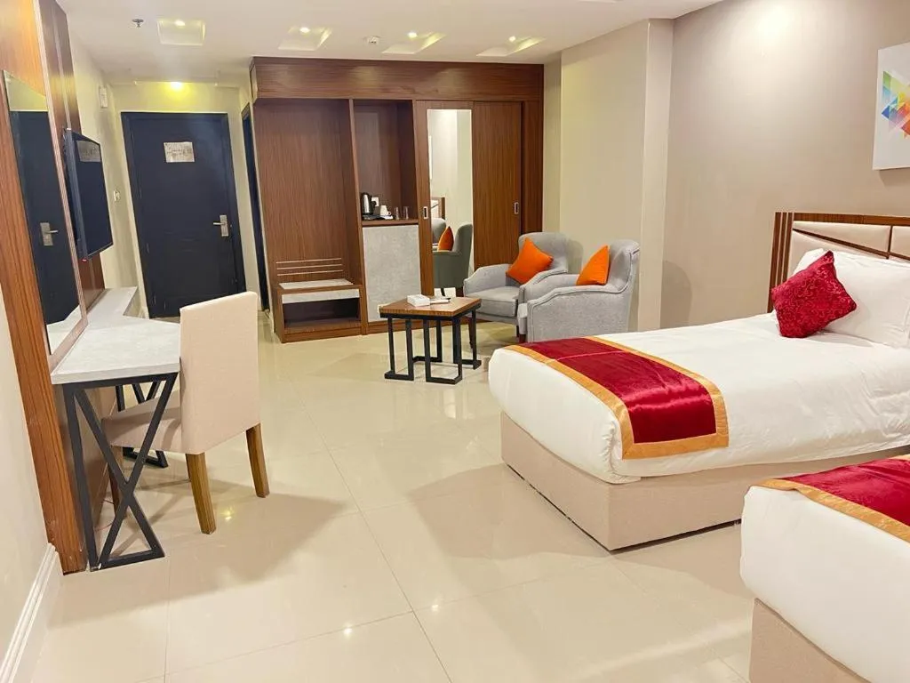 Bed in Remaz Suites Hotel