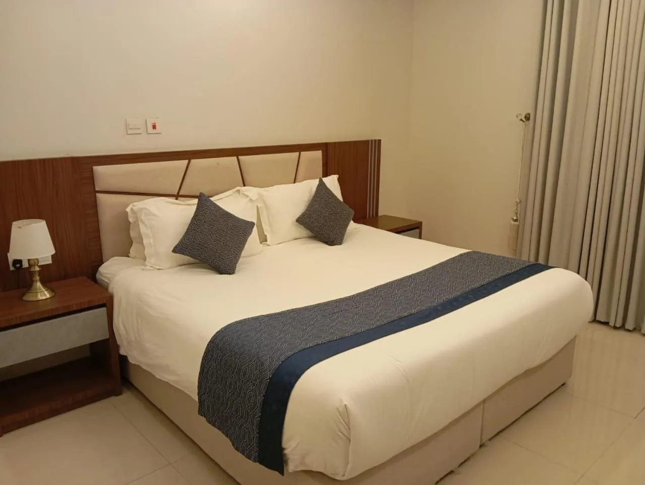 Bed in Remaz Suites Hotel