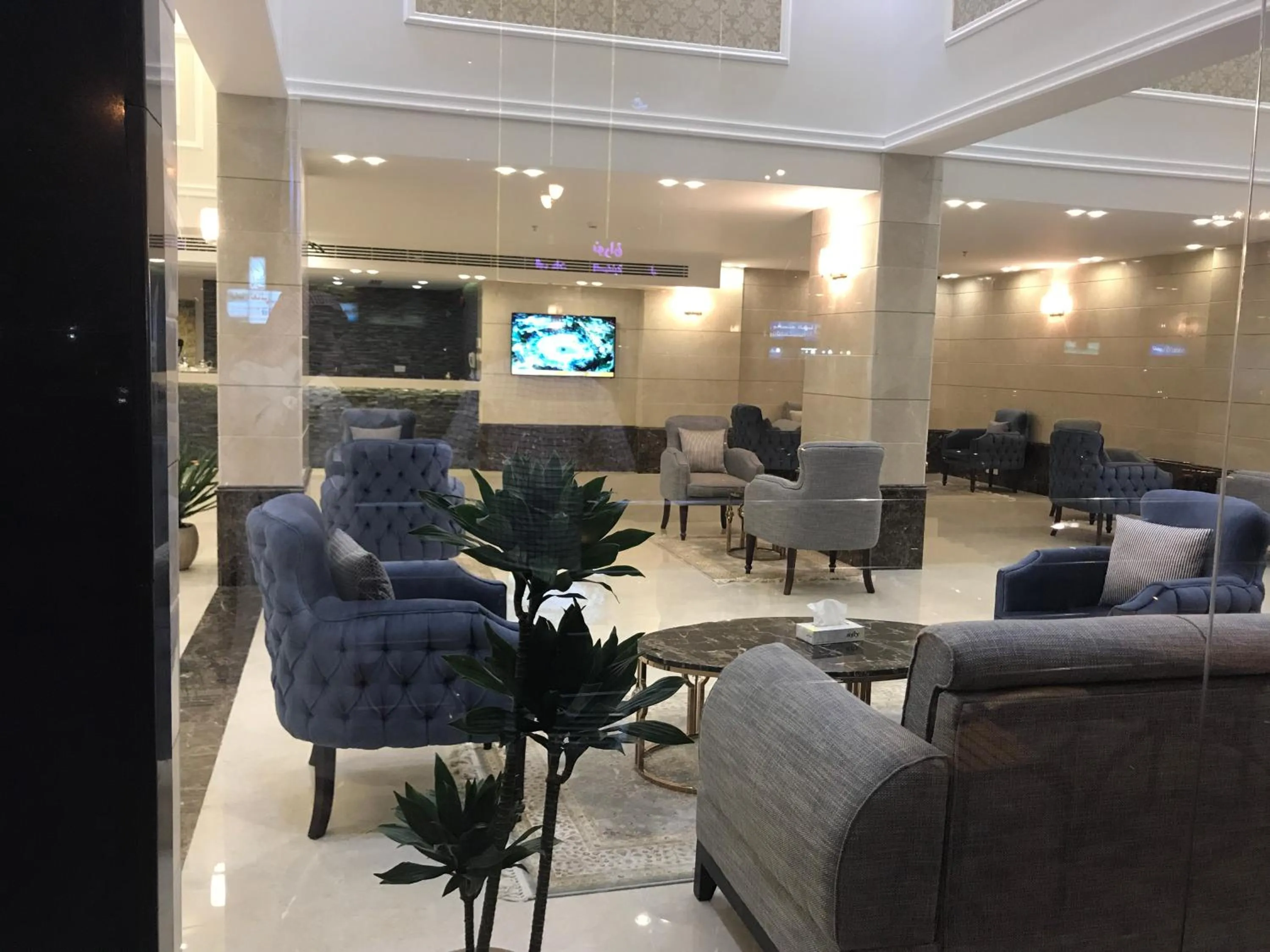 Lobby or reception in Remaz Suites Hotel