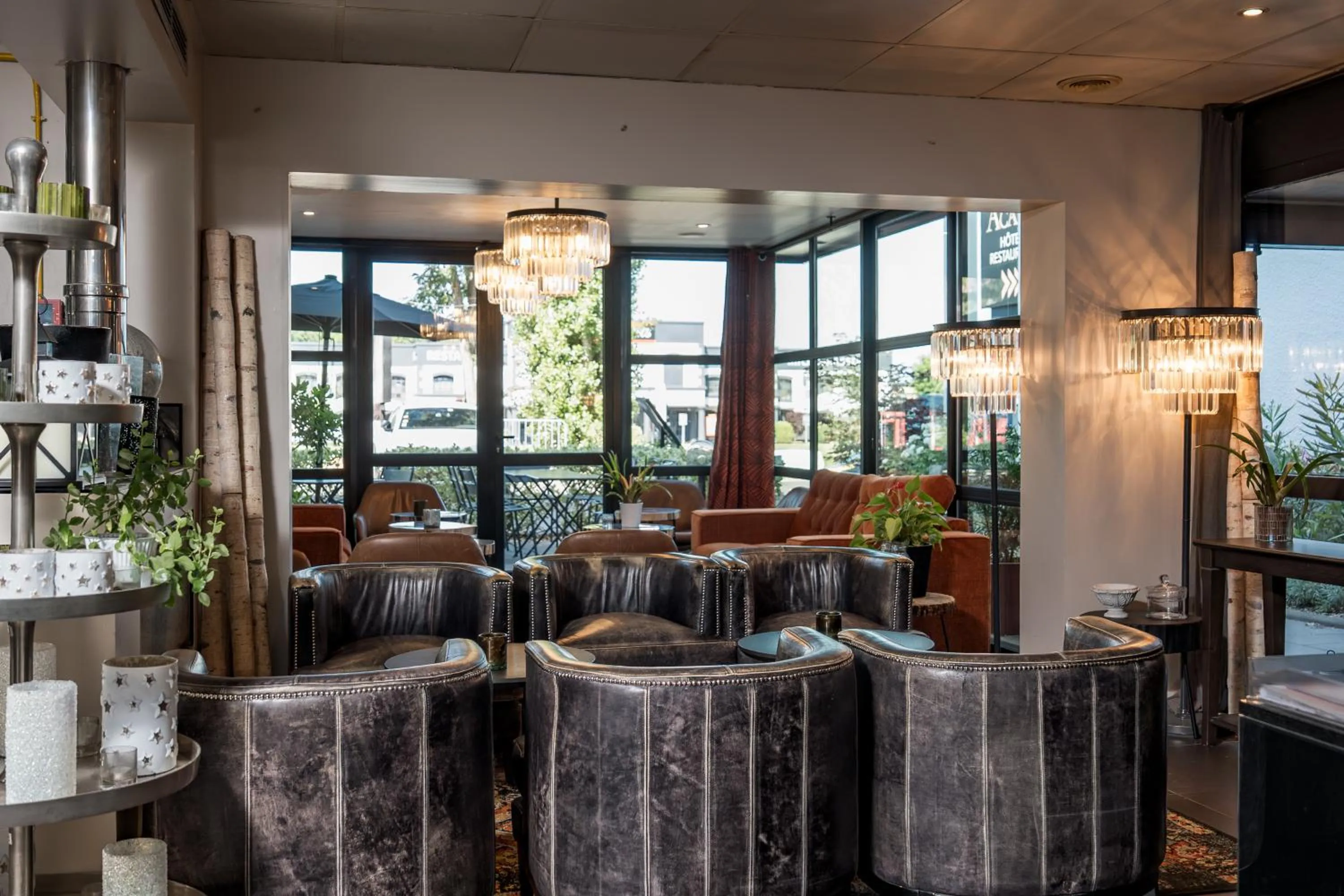 Communal lounge/ TV room in Hotel Acadie Eragny