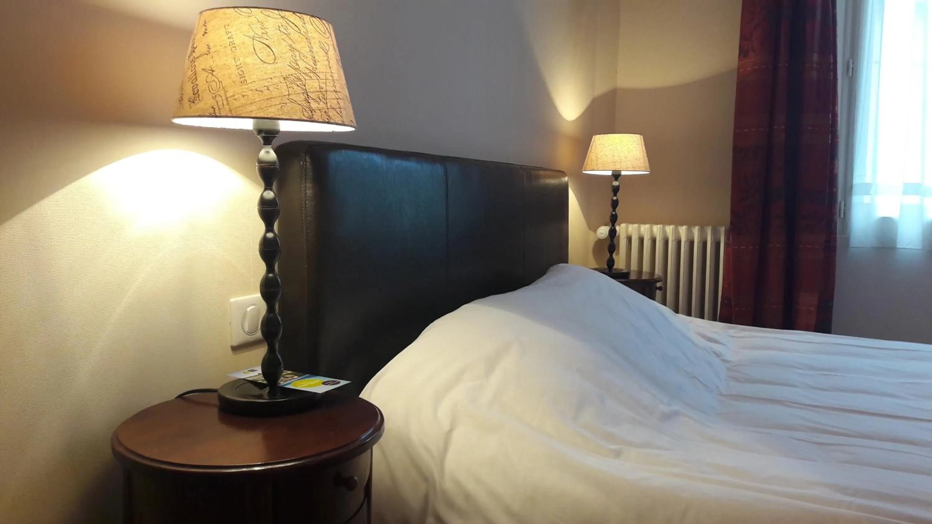 Decorative detail, Bed in Hotel Les Aubépines