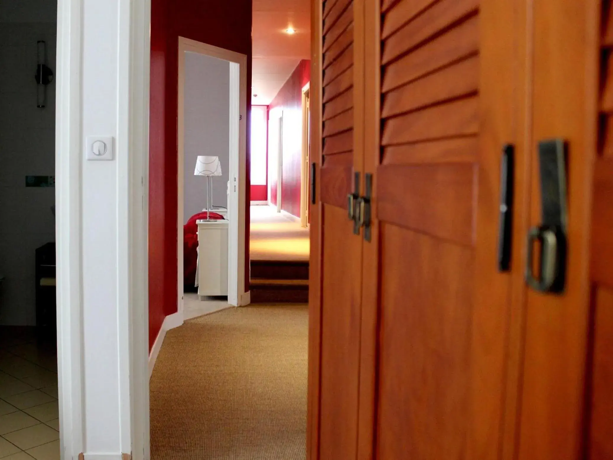 Decorative detail, Bed in Hotel Les Aubépines Decorative detail, Bed in Hotel Les Aubépines