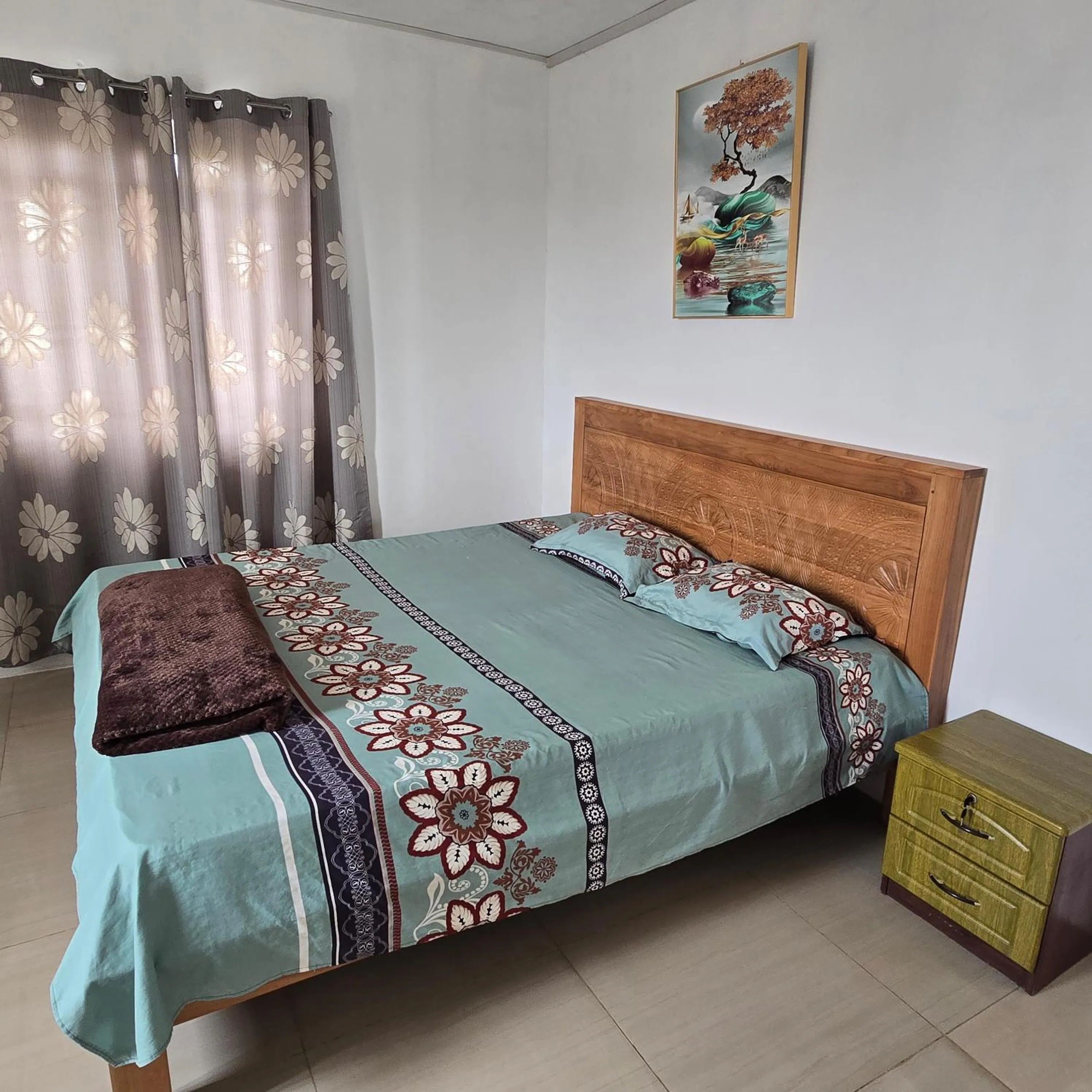 Bed in Green Discovery B&B Tamarind Falls 7 Cascades