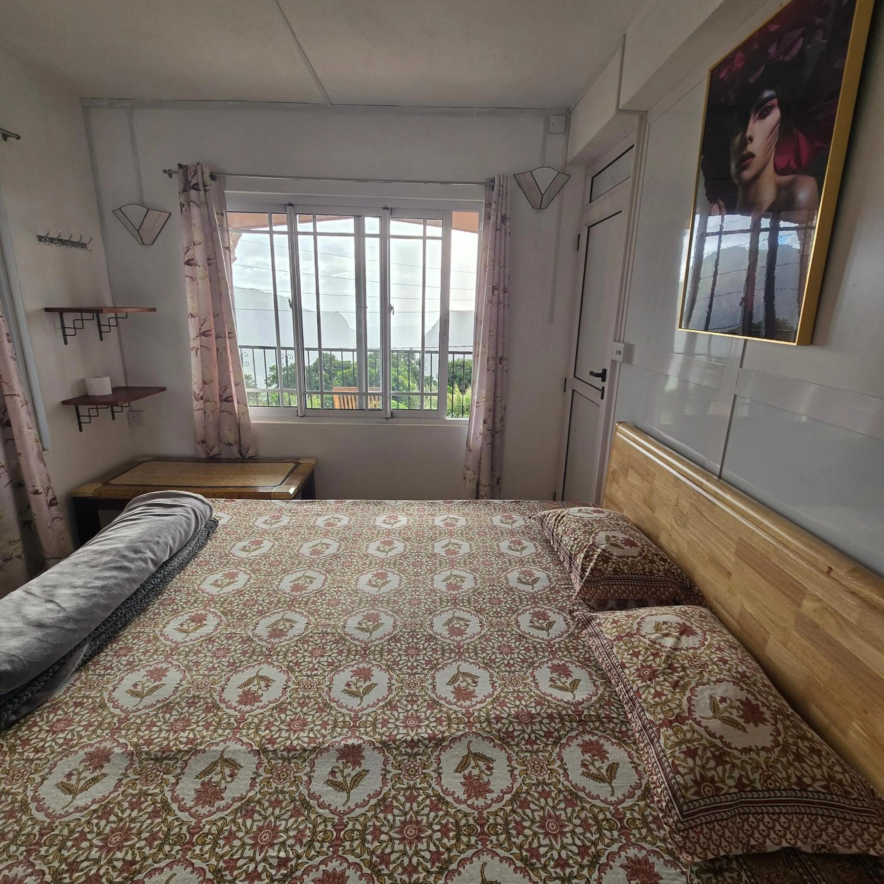 Bed in Green Discovery B&B Tamarind Falls 7 Cascades