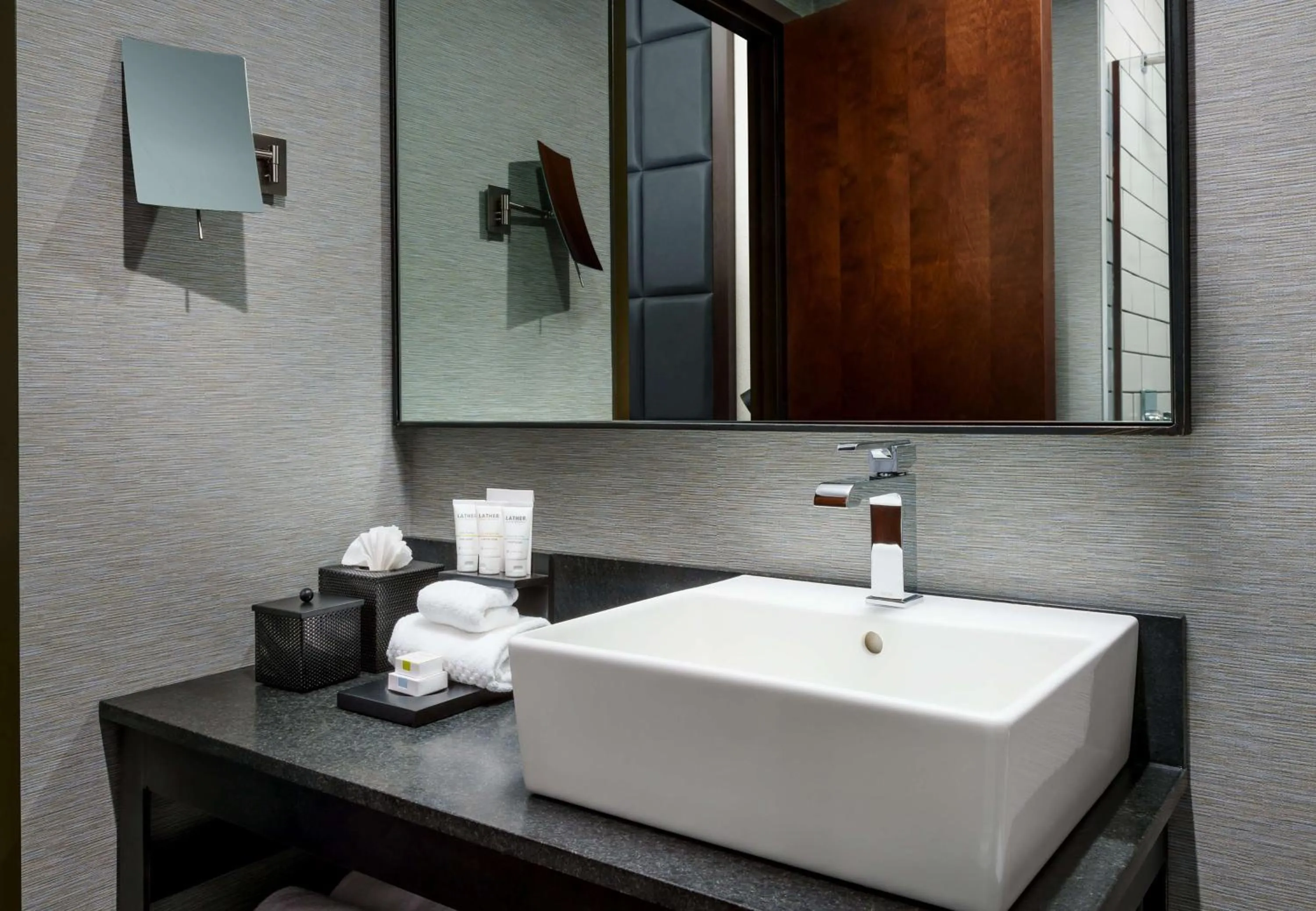 Bathroom in Joinery Hotel Pittsburgh, Curio Collection by Hilton