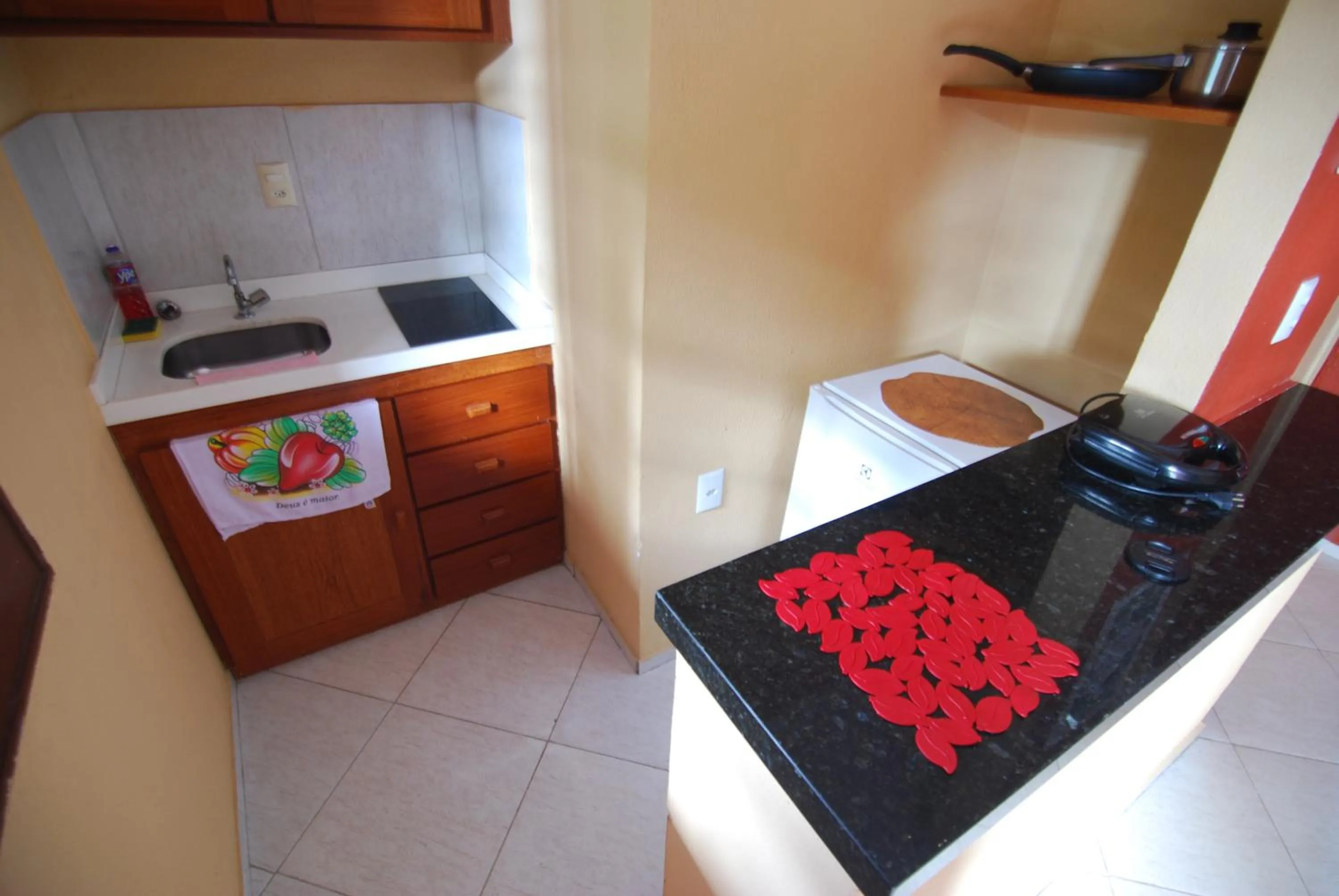 Kitchen or kitchenette in Refúgio Pousada Fortaleza