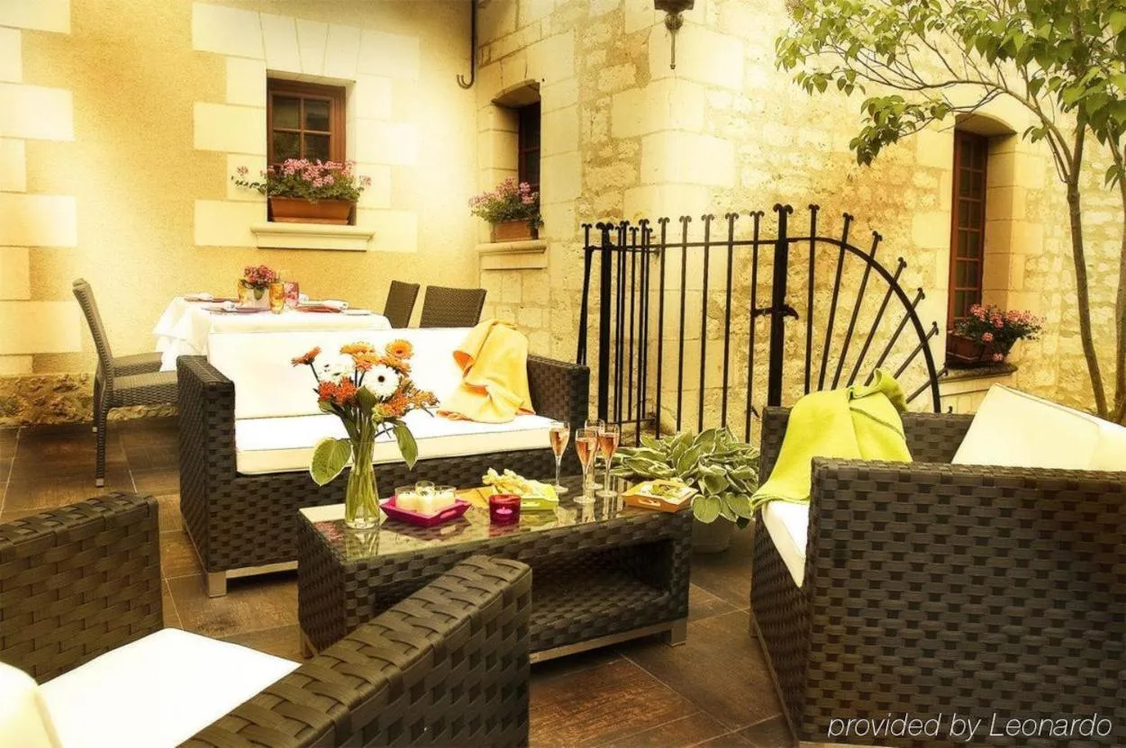 Patio in Logis Hotel La Croix Blanche Fontevraud