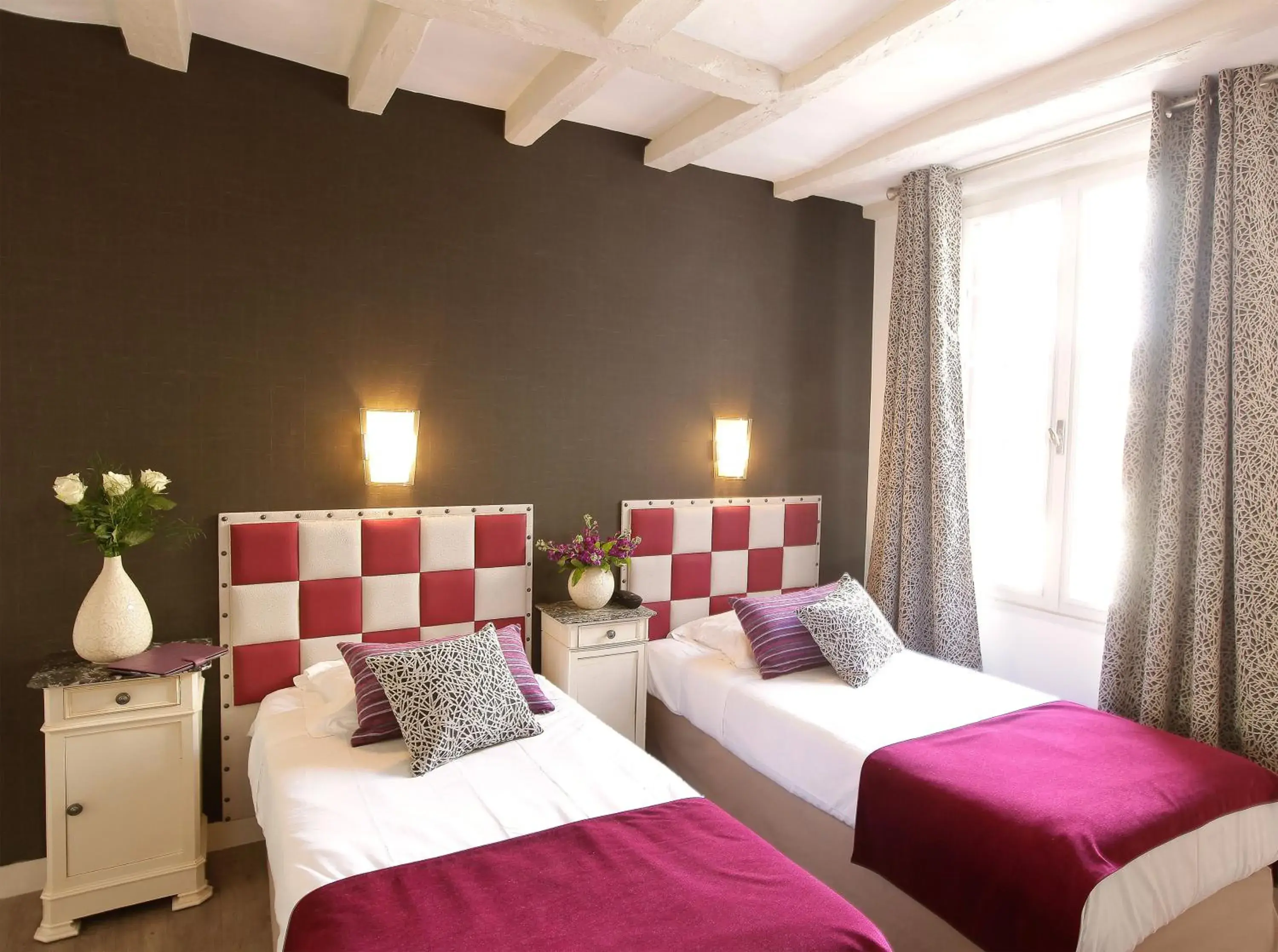 Decorative detail, Bed in Logis Hotel La Croix Blanche Fontevraud Decorative detail, Bed in Logis Hotel La Croix Blanche Fontevraud