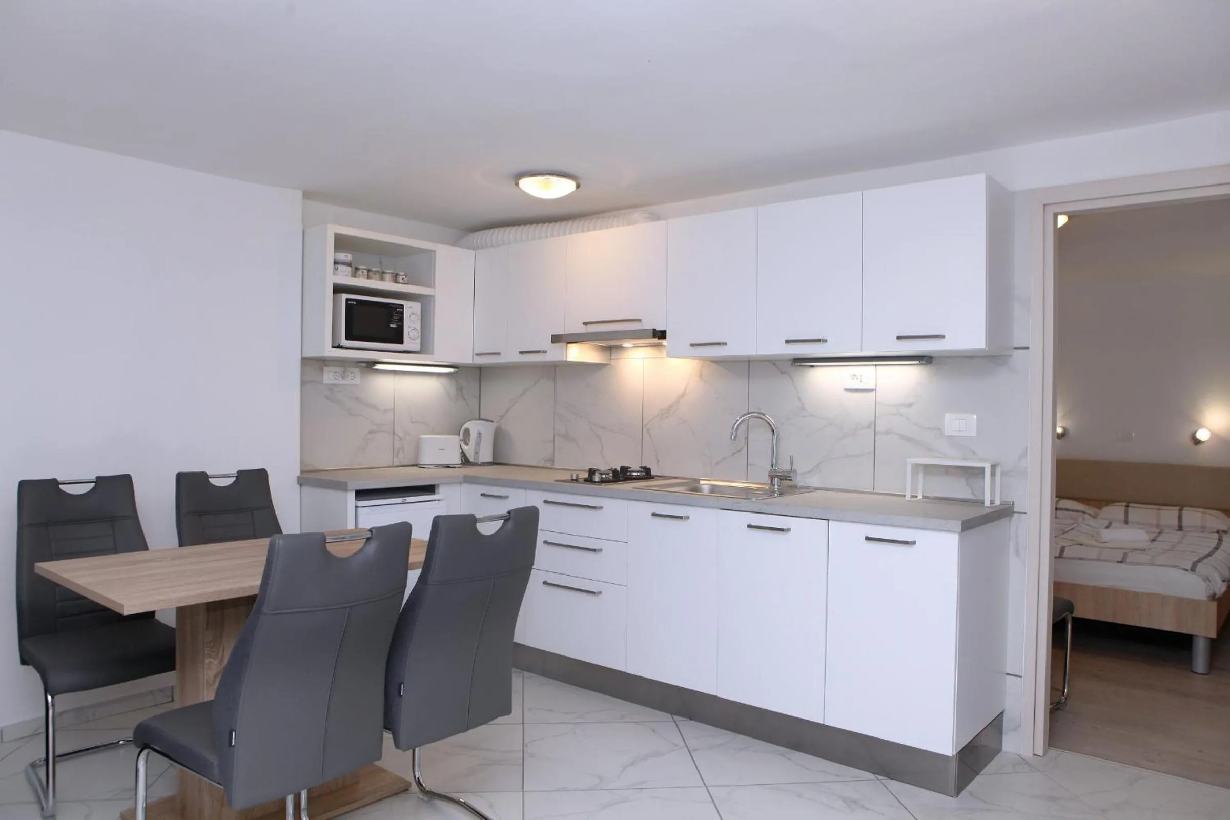 Kitchen or kitchenette in Apartmaji sončne terase - Sunny Terraces Apartments