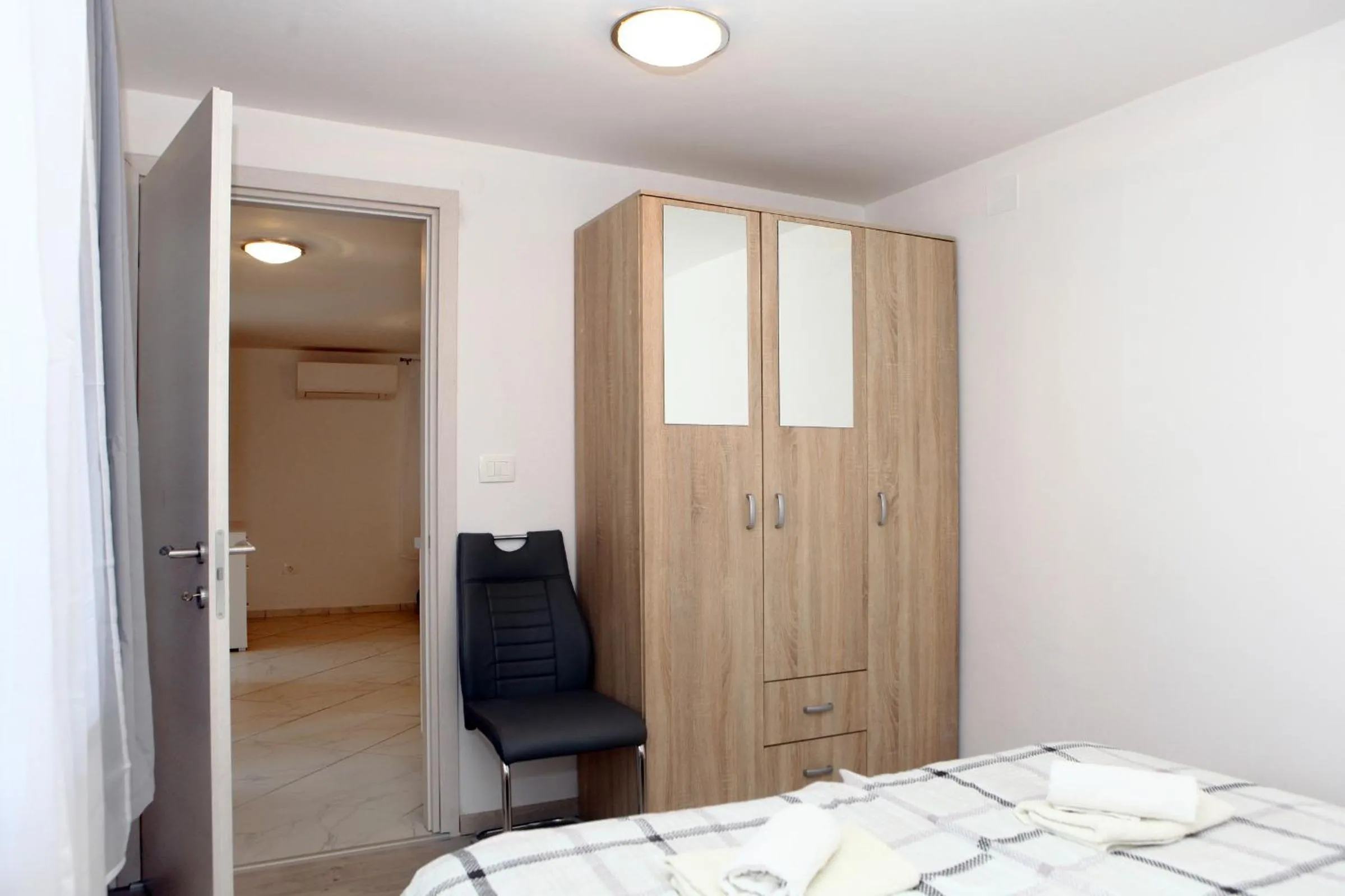 Bed in Apartmaji sončne terase - Sunny Terraces Apartments