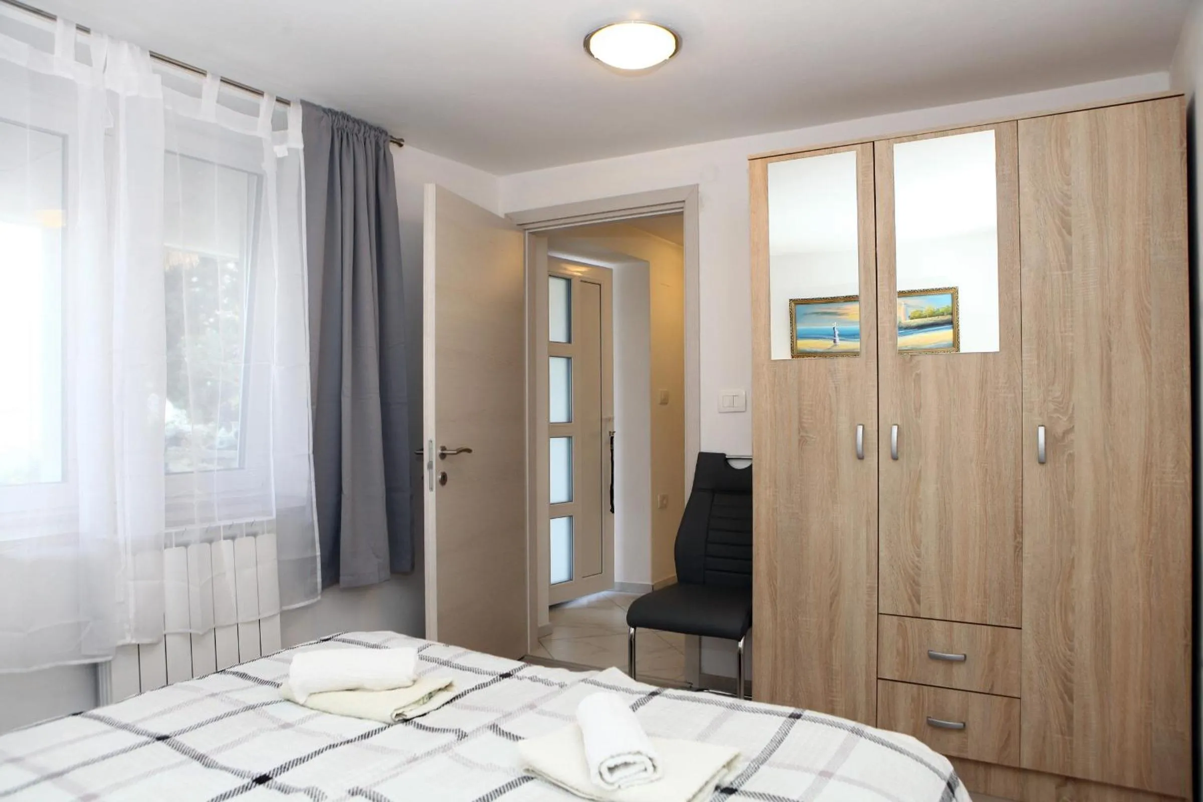 Bed in Apartmaji sončne terase - Sunny Terraces Apartments
