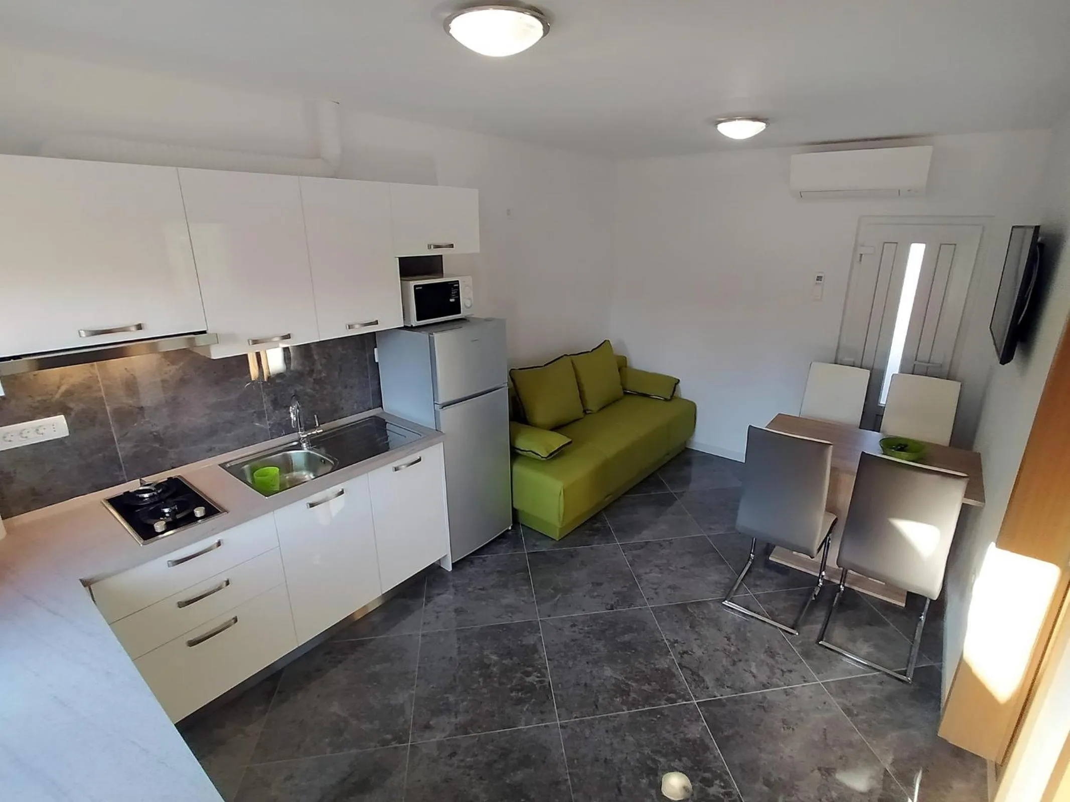 Kitchen or kitchenette in Apartmaji sončne terase - Sunny Terraces Apartments
