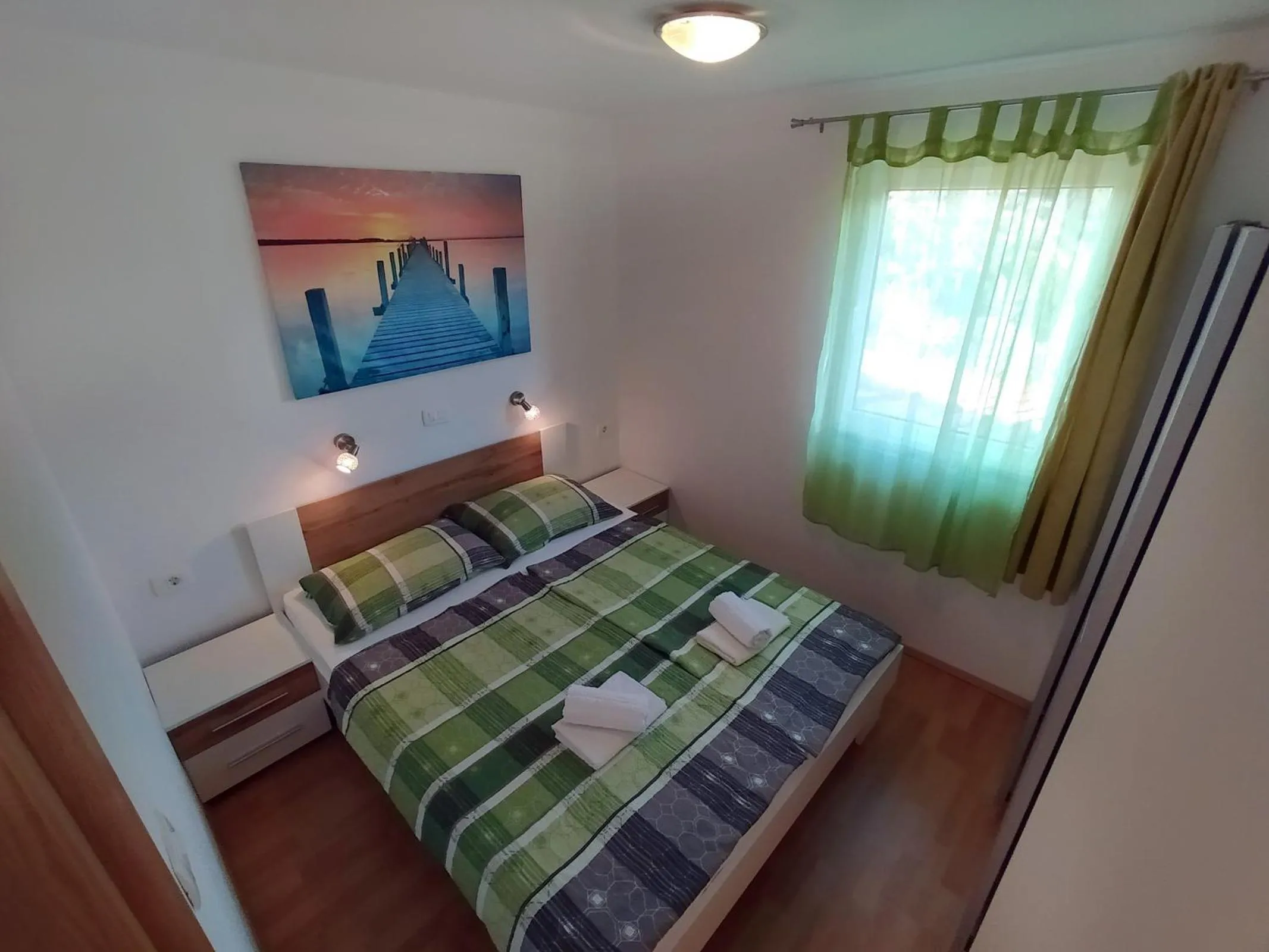 Bed in Apartmaji sončne terase - Sunny Terraces Apartments