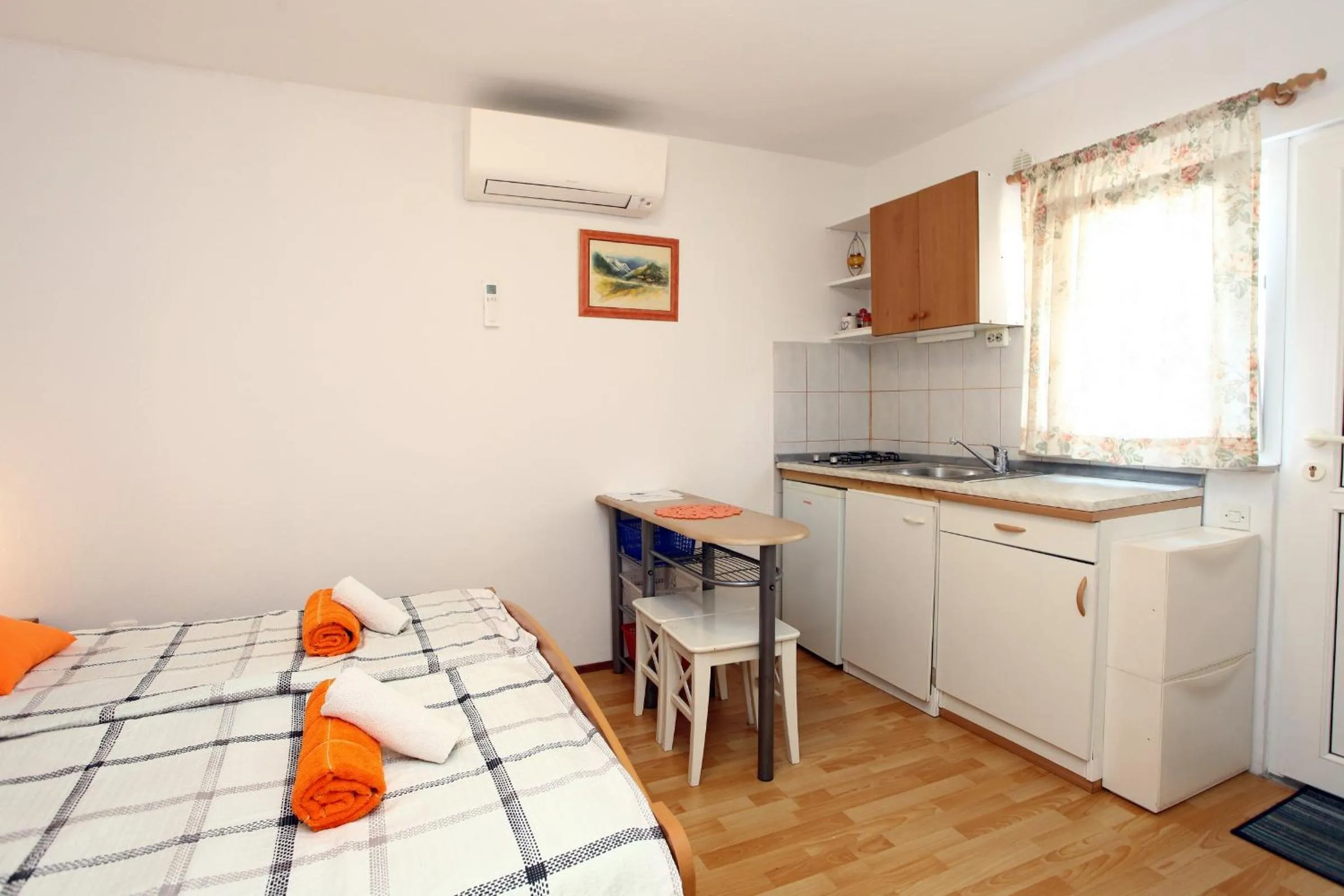 Kitchen or kitchenette, Bed in Apartmaji sončne terase - Sunny Terraces Apartments