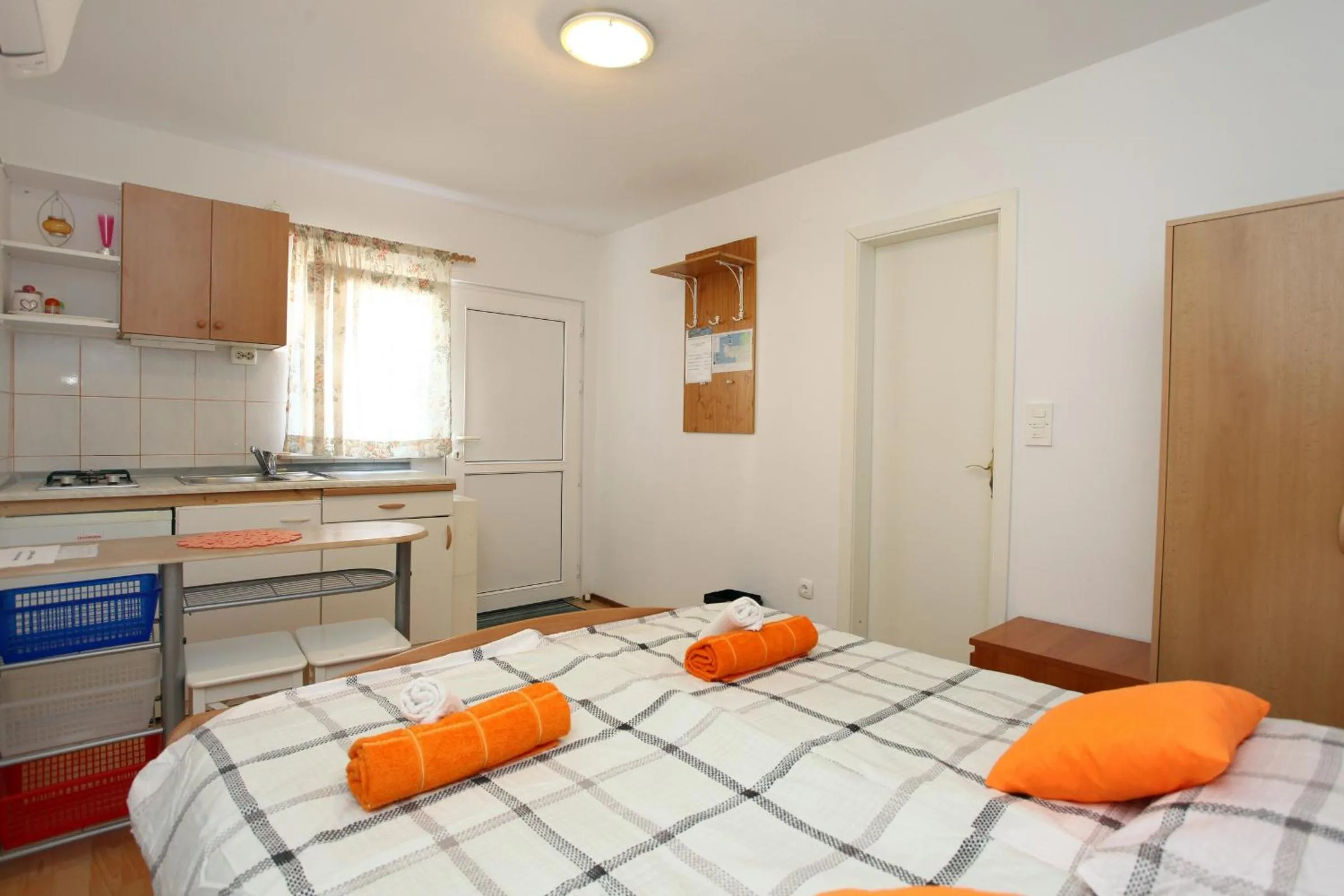 Kitchen or kitchenette, Bed in Apartmaji sončne terase - Sunny Terraces Apartments