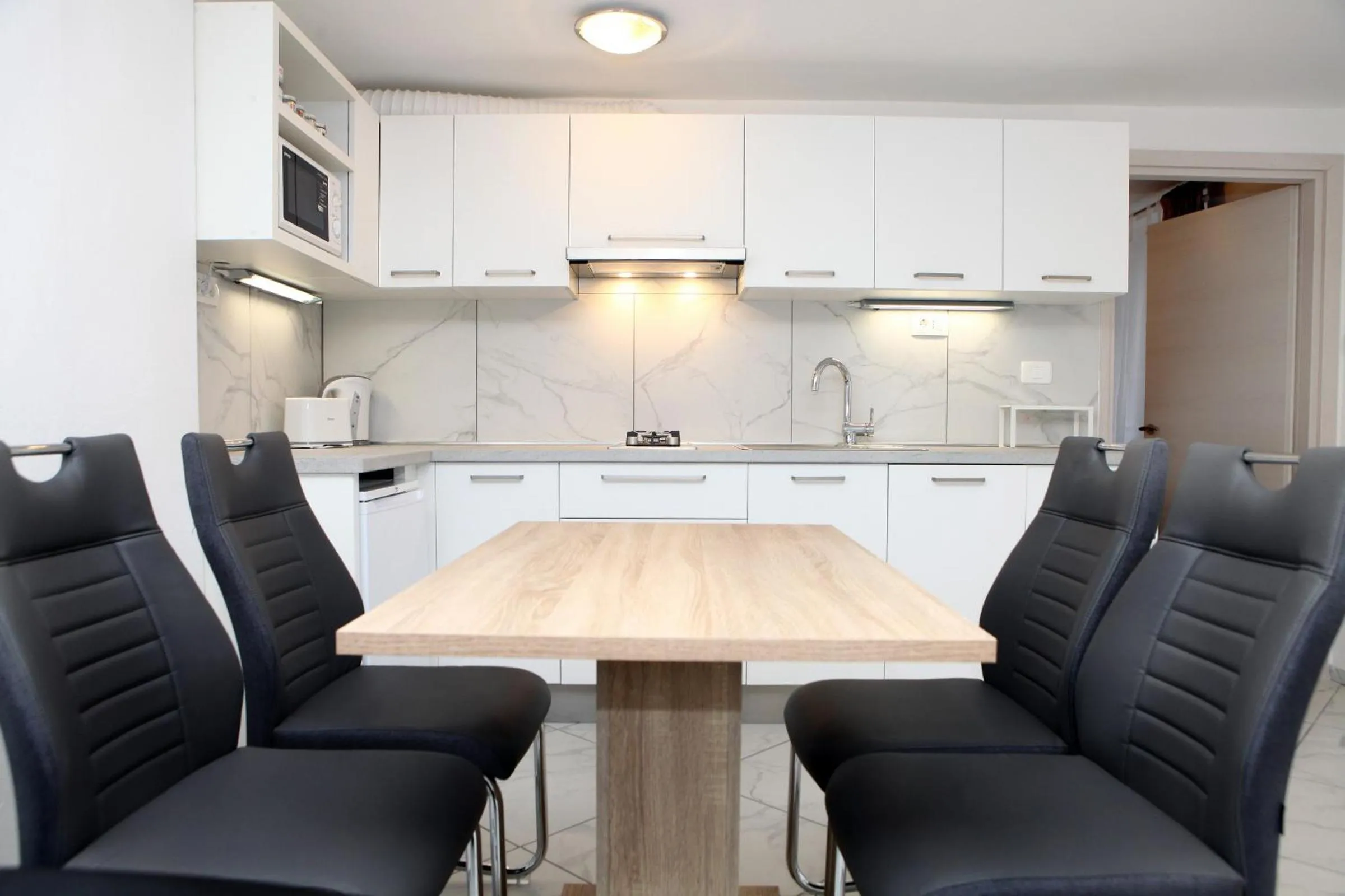 Kitchen or kitchenette in Apartmaji sončne terase - Sunny Terraces Apartments