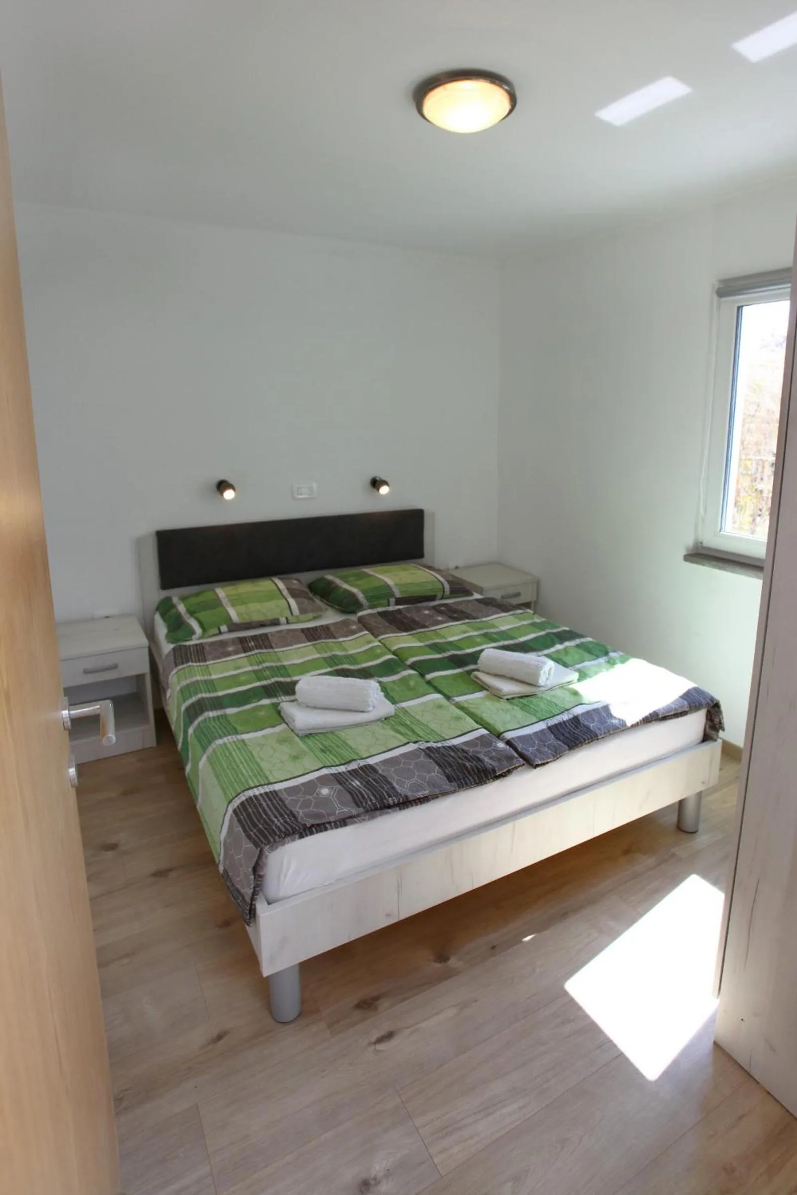 Bed in Apartmaji sončne terase - Sunny Terraces Apartments