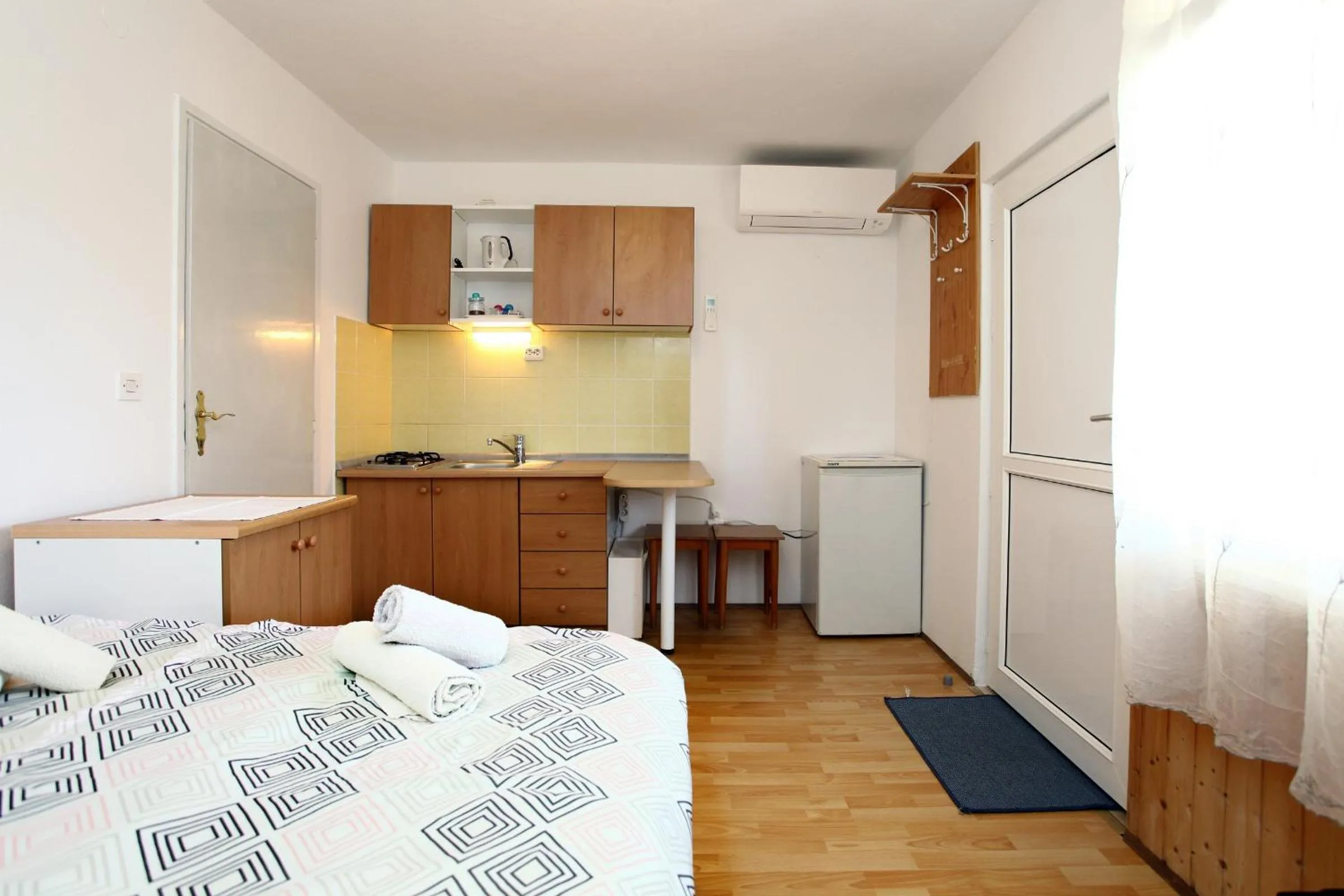 Kitchen or kitchenette, Bed in Apartmaji sončne terase - Sunny Terraces Apartments