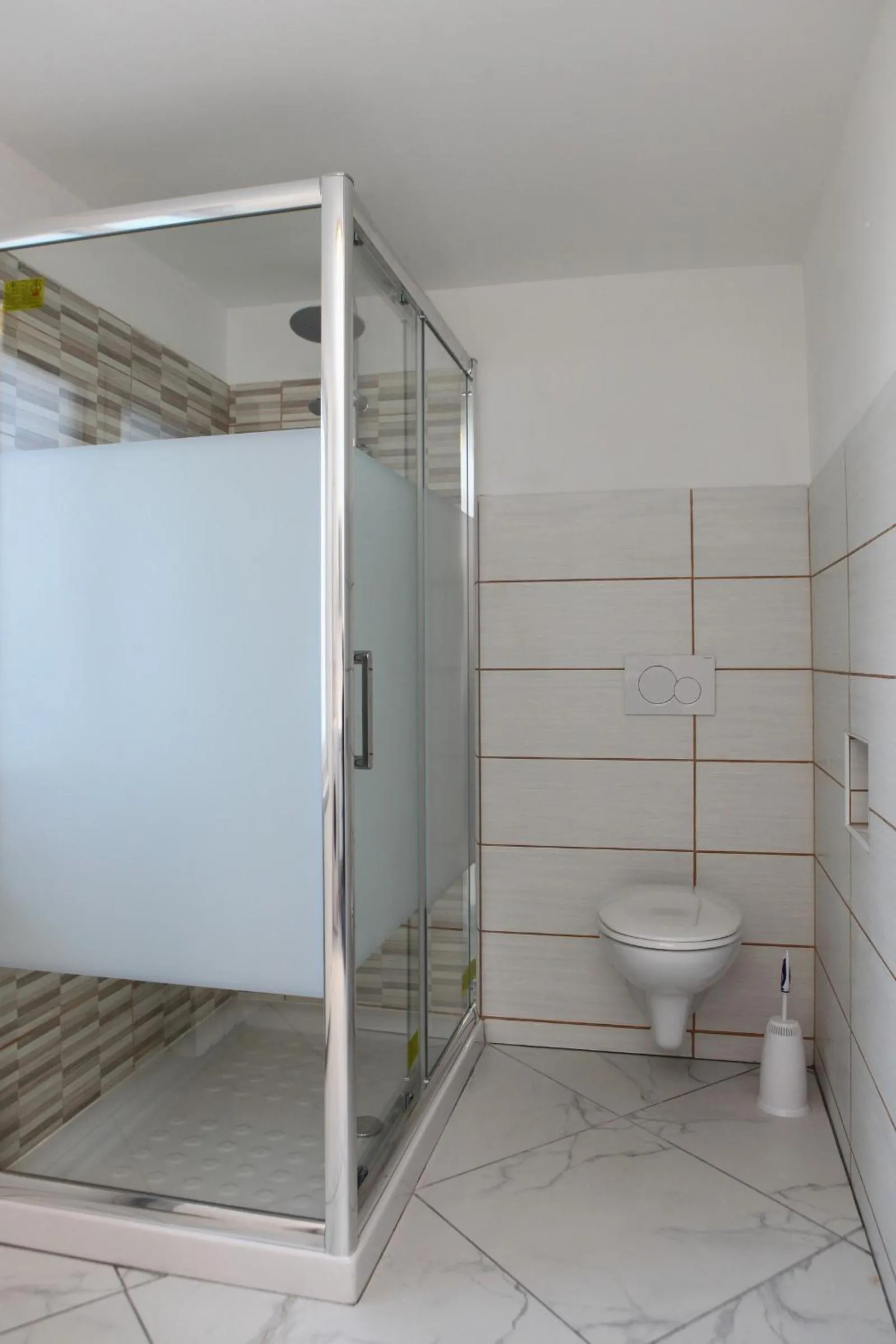Shower in Apartmaji sončne terase - Sunny Terraces Apartments