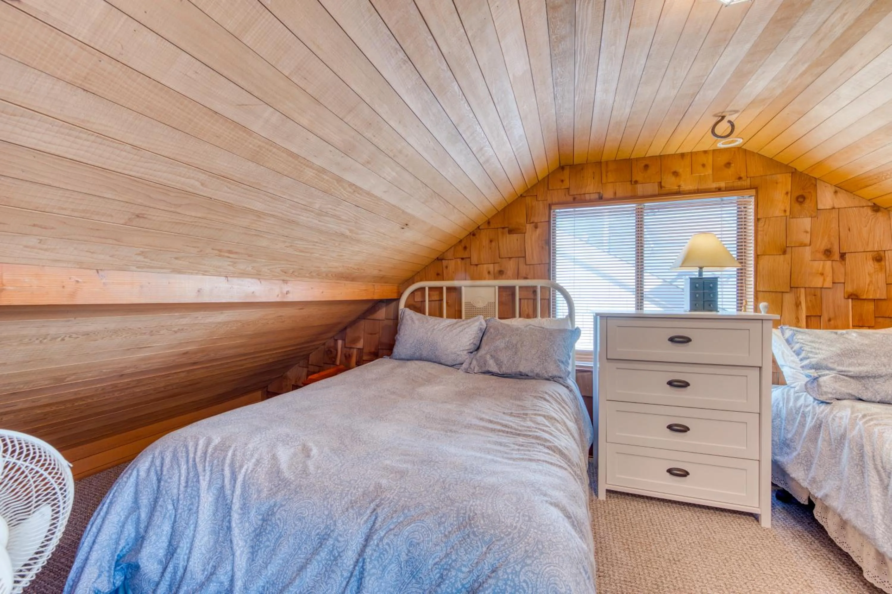 Bed in Oceanfront Cottage