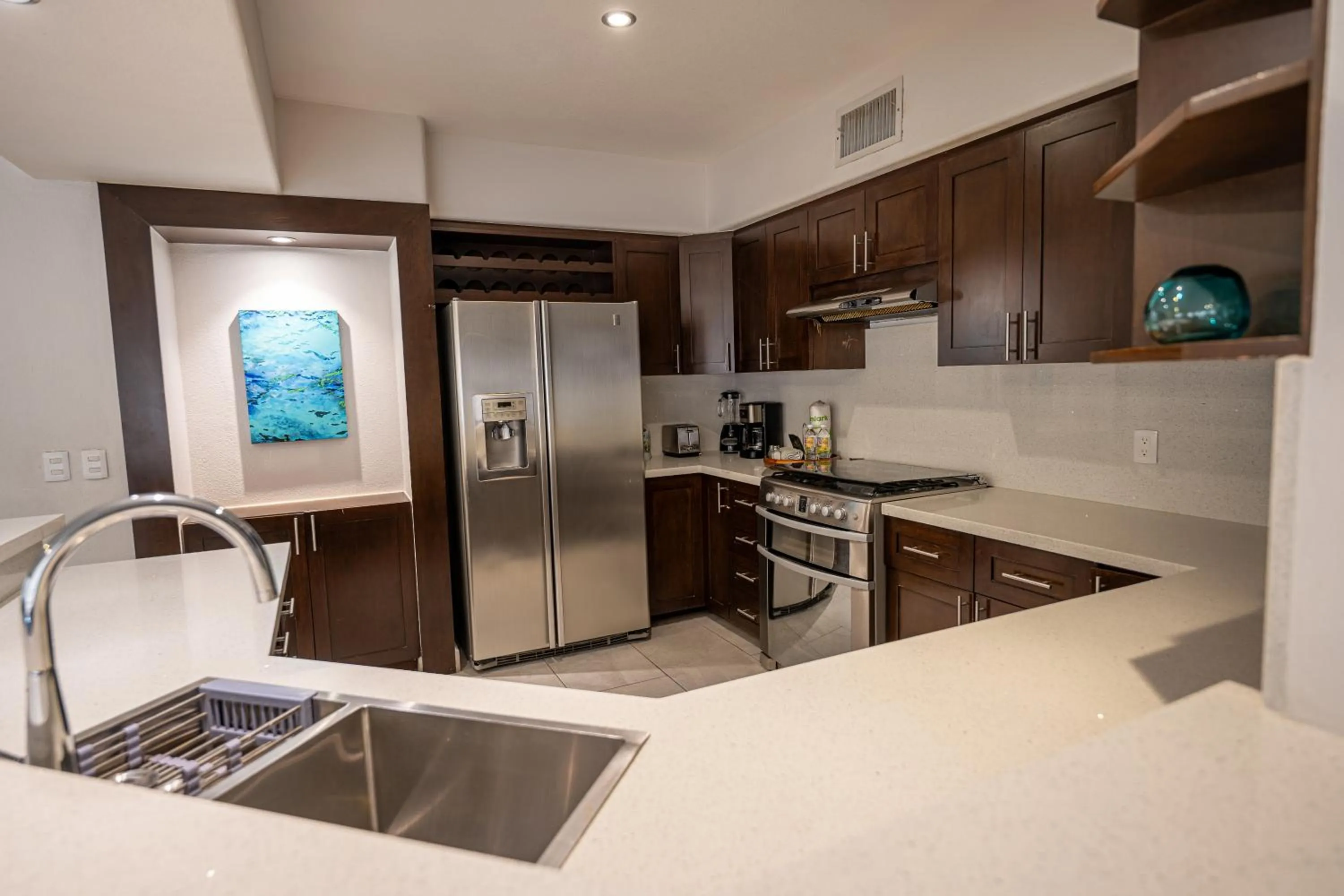 Kitchen or kitchenette, Bed in Laguna Shores Resort