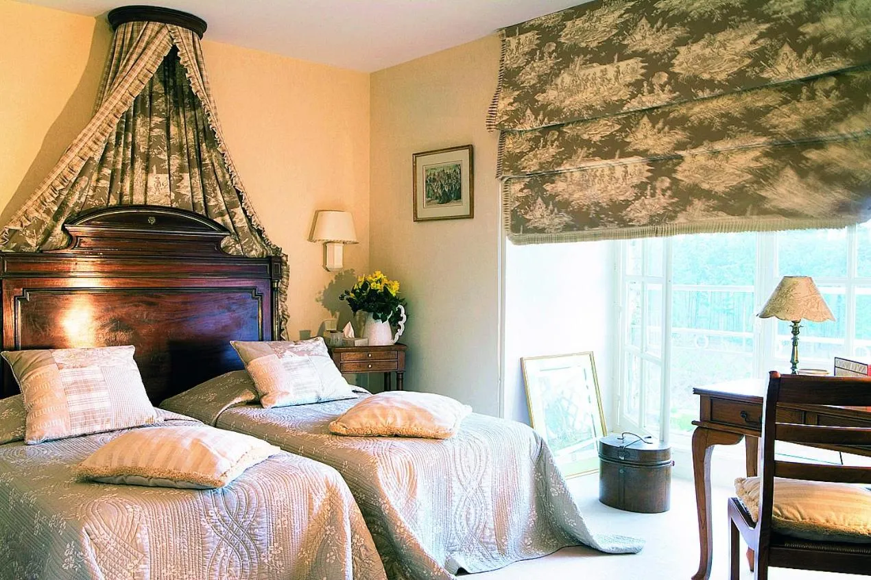 Photo of the whole room, Bed in Chateau Colbert