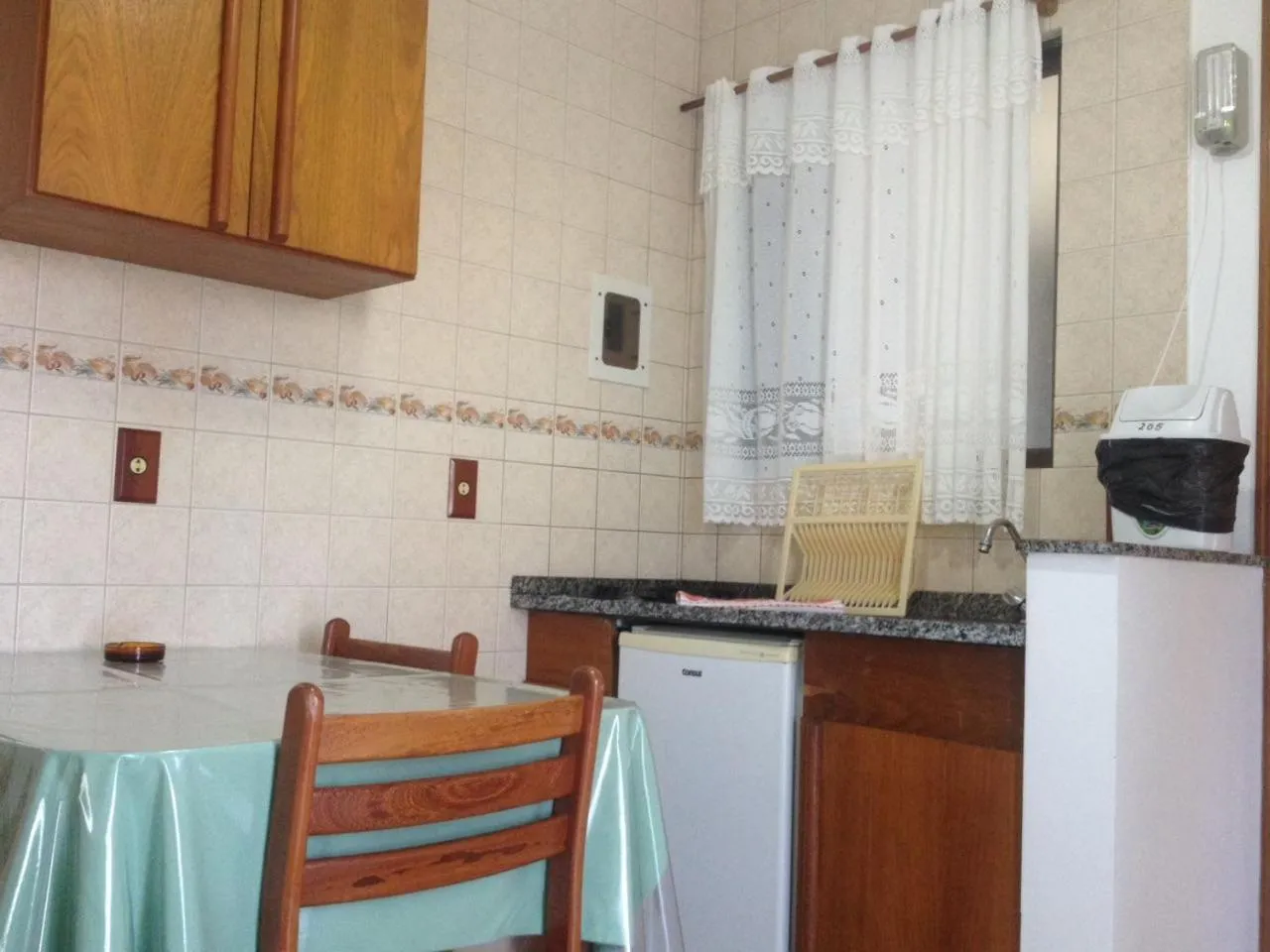 Kitchen or kitchenette in Raio do Sol Residence