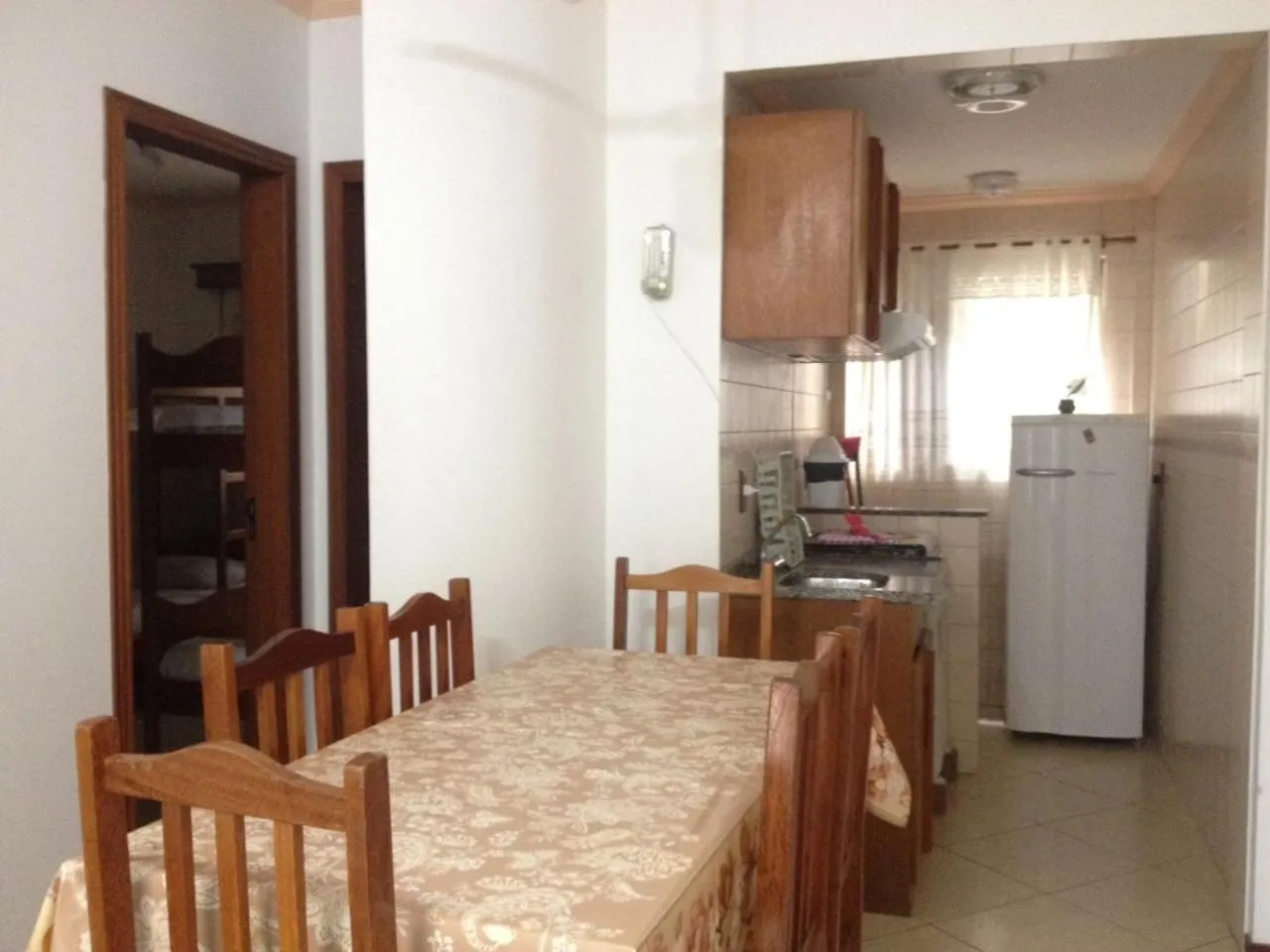 Kitchen or kitchenette in Raio do Sol Residence