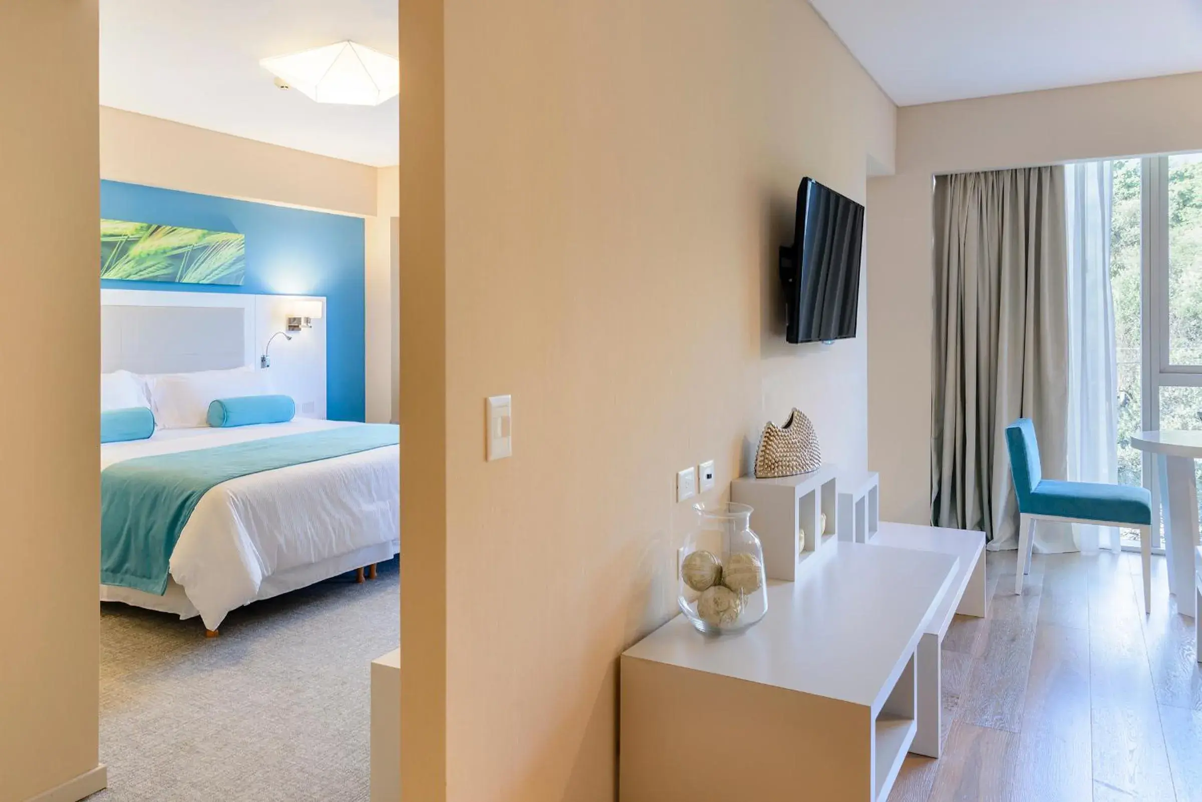 Living room, Bed in Epic Hotel Villa de Merlo Living room, Bed in Epic Hotel Villa de Merlo