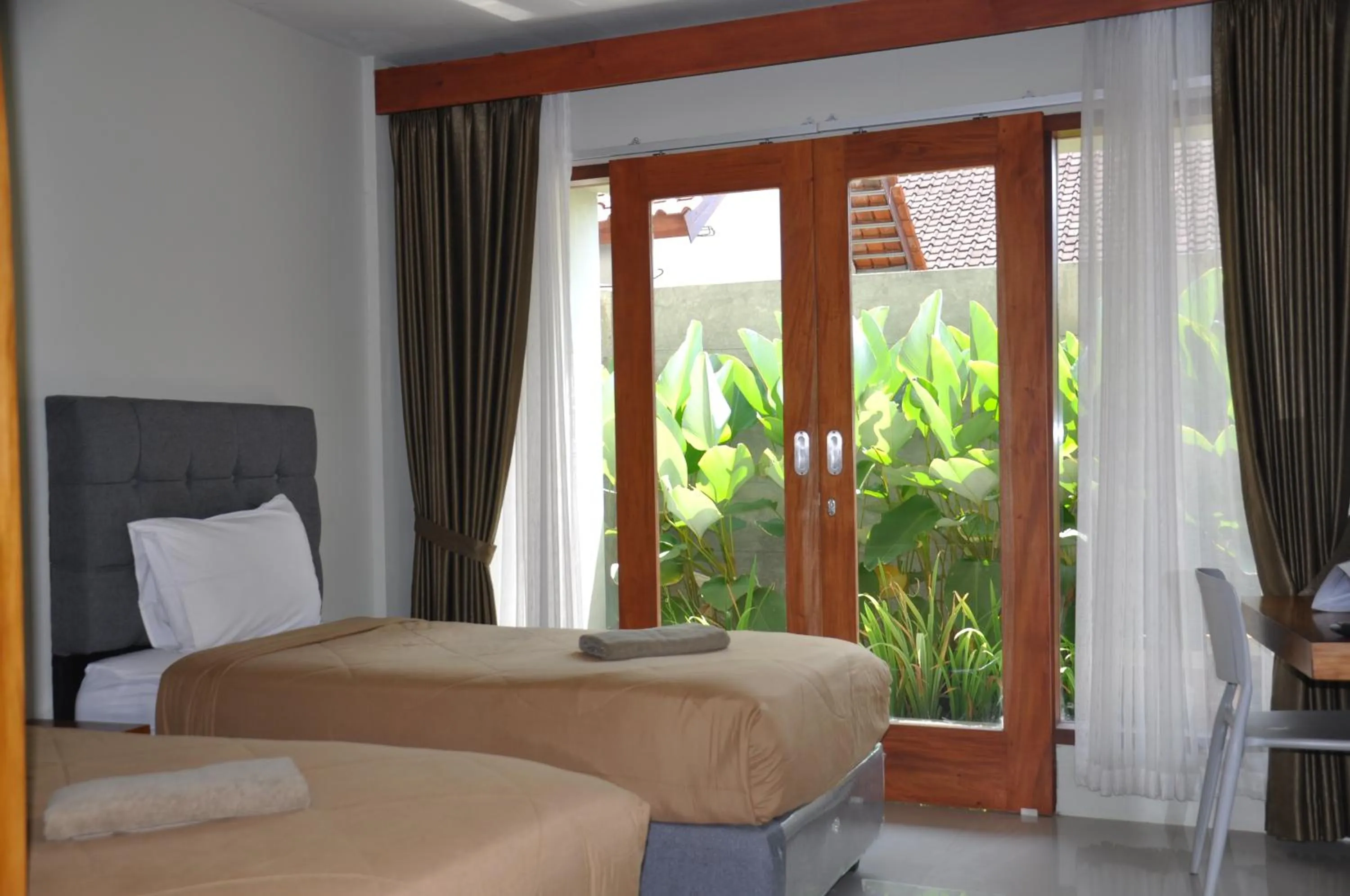 Bed in Hastina Hotel Lombok