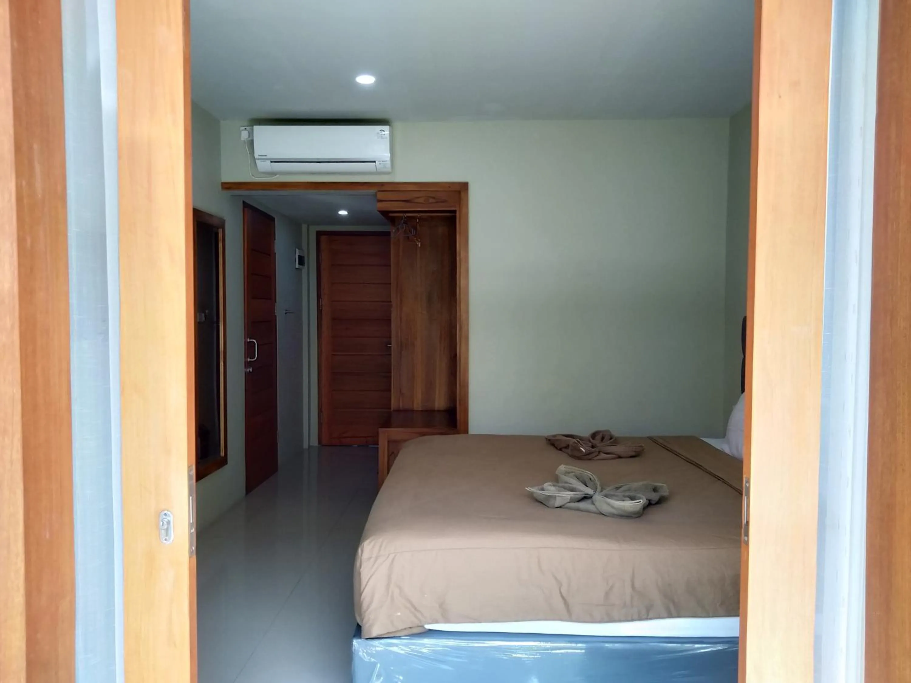 Bed in Hastina Hotel Lombok