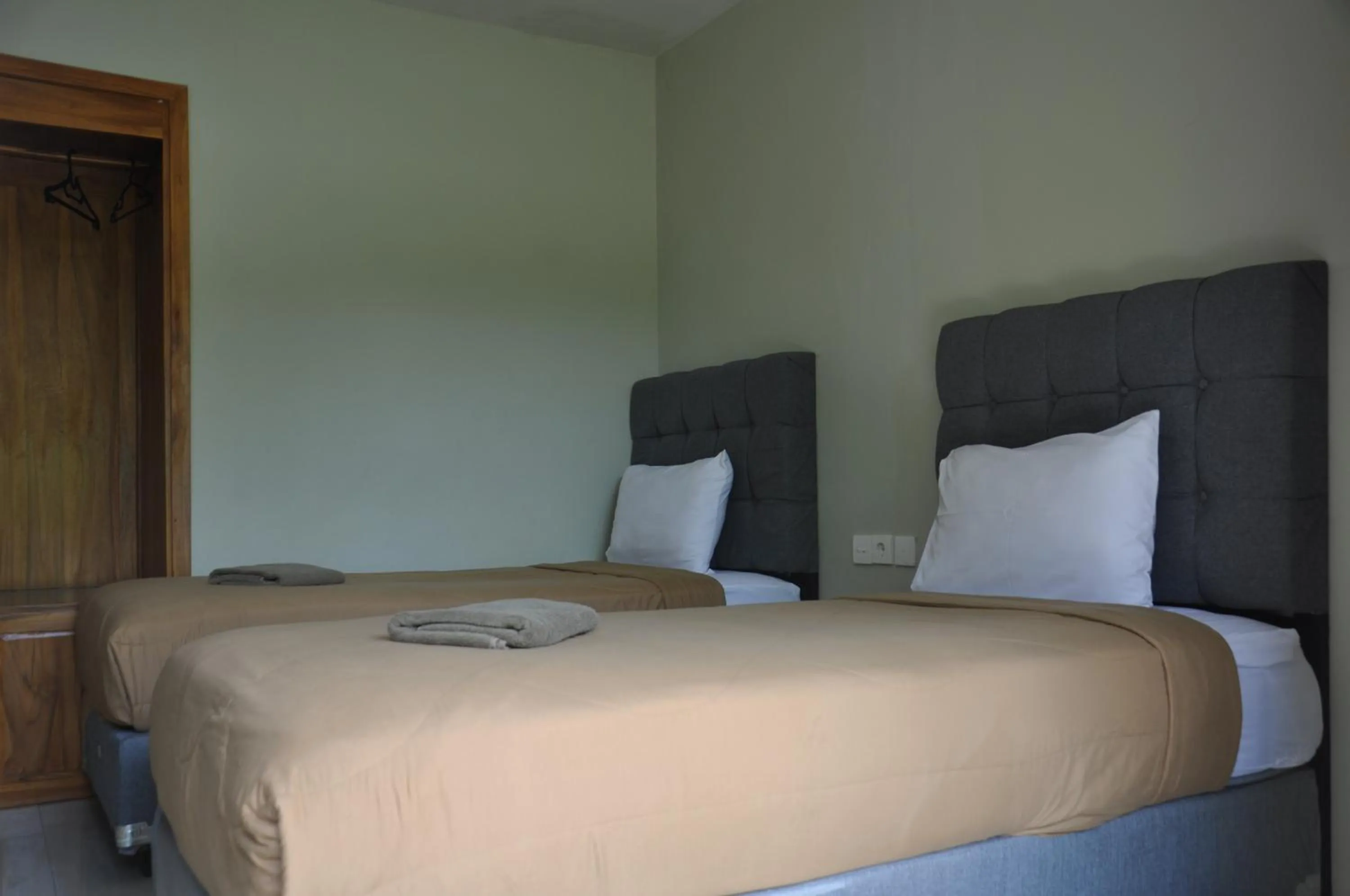 Bed in Hastina Hotel Lombok