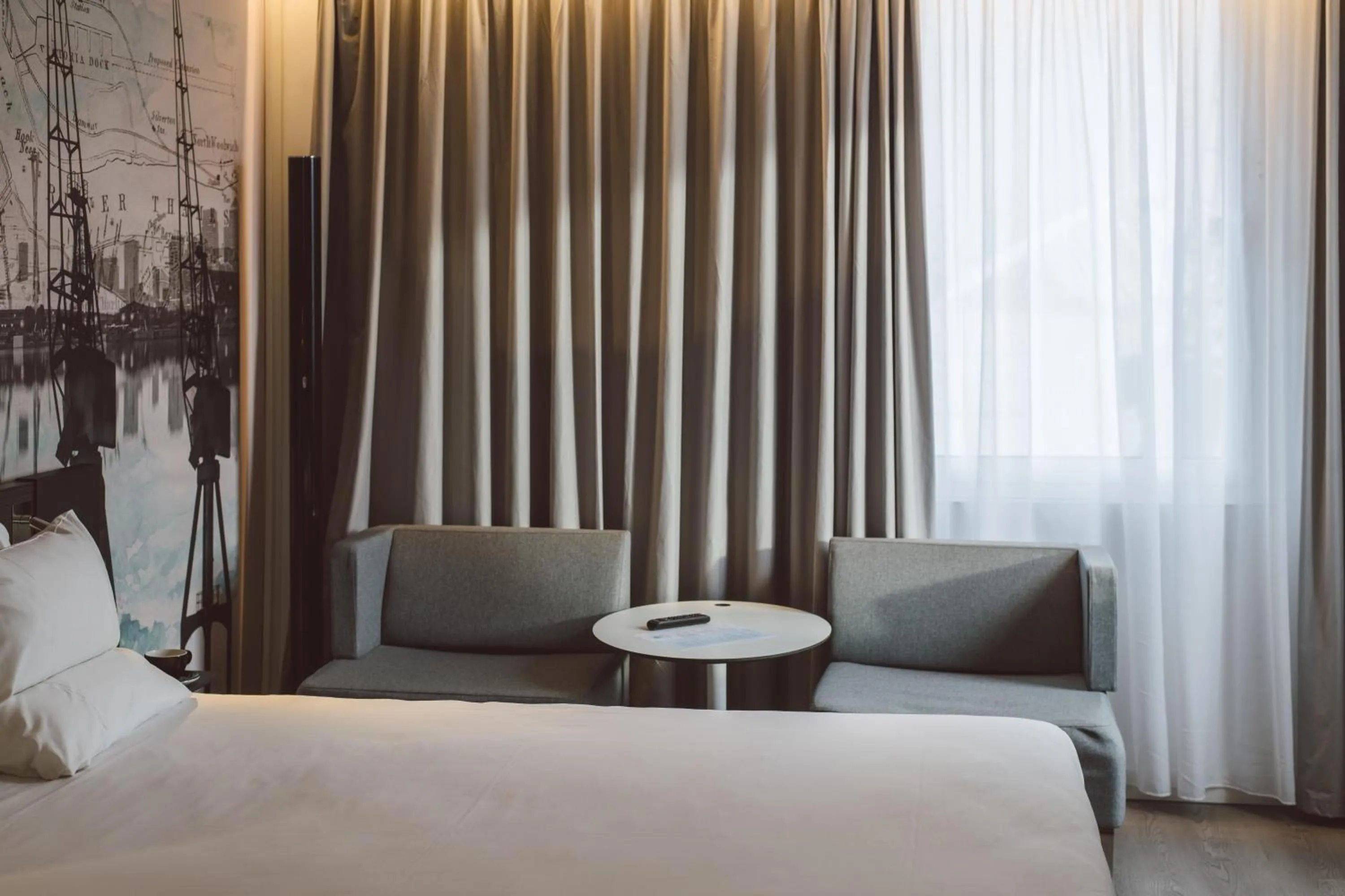 Seating area, Bed in Novotel London Excel