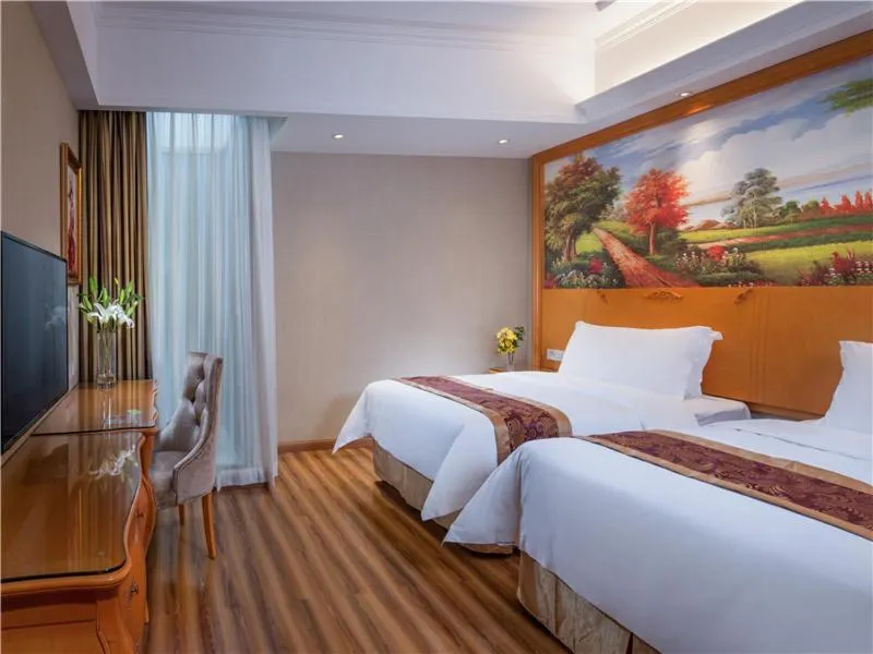 Bed in Vienna International Hotel (Shen Zhen Buji Dafen shop)