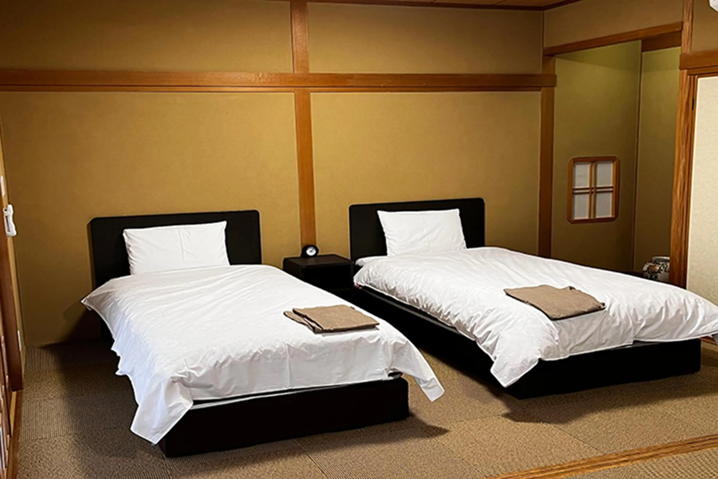Bed in Toyokawa Grand Hotel