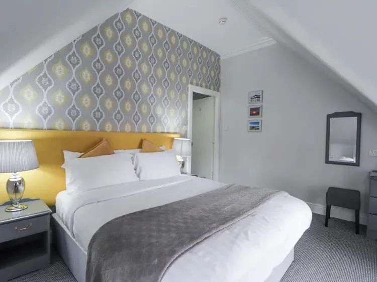 Bed in McInnes House rooms with breakfast