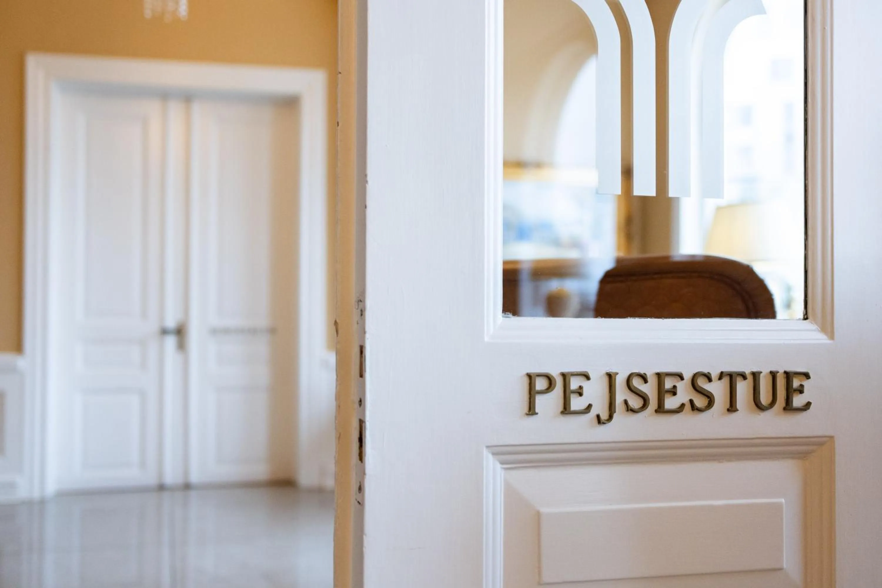 Property logo or sign in Milling Hotel Plaza