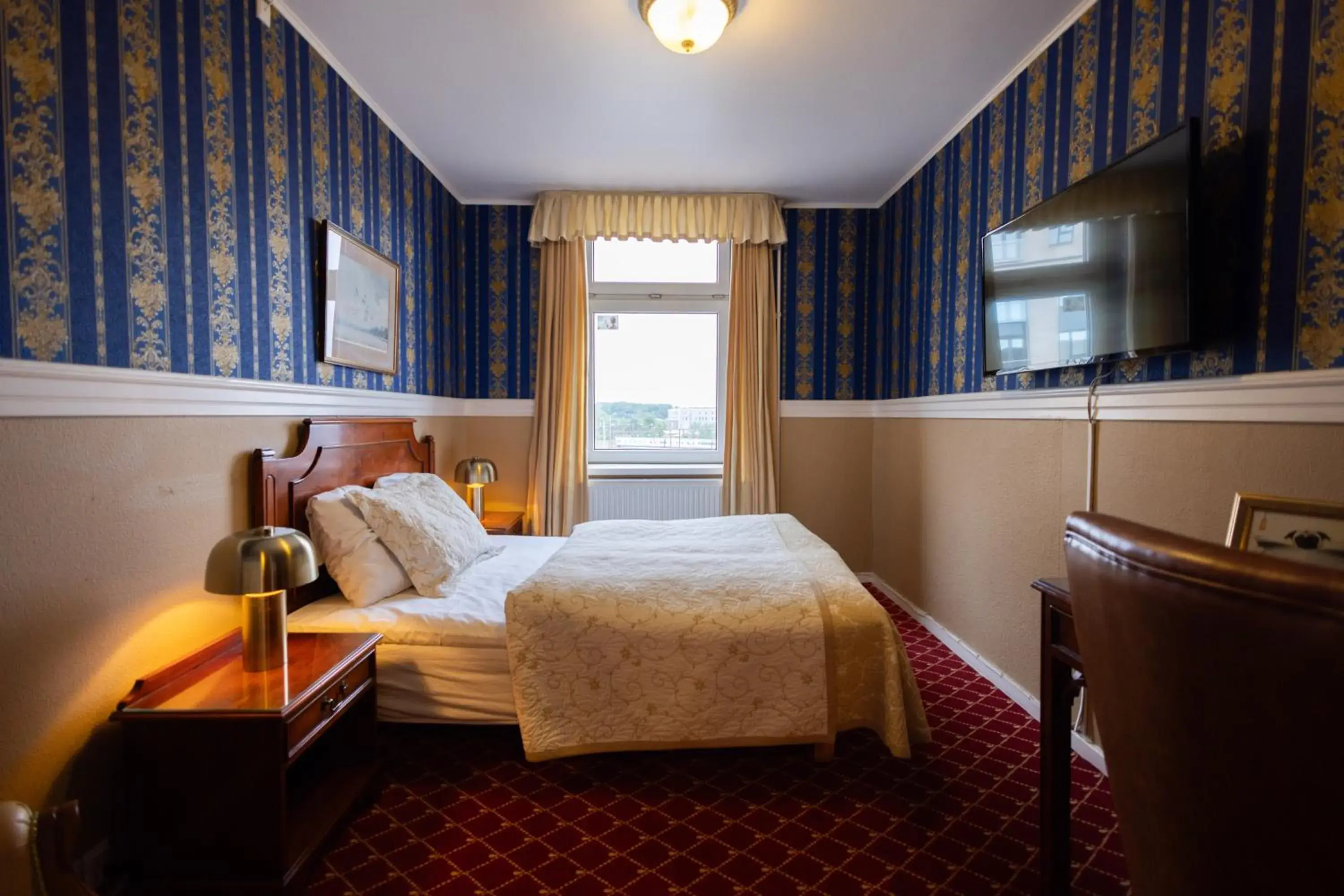 Small Double Room in Milling Hotel Plaza Small Double Room in Milling Hotel Plaza