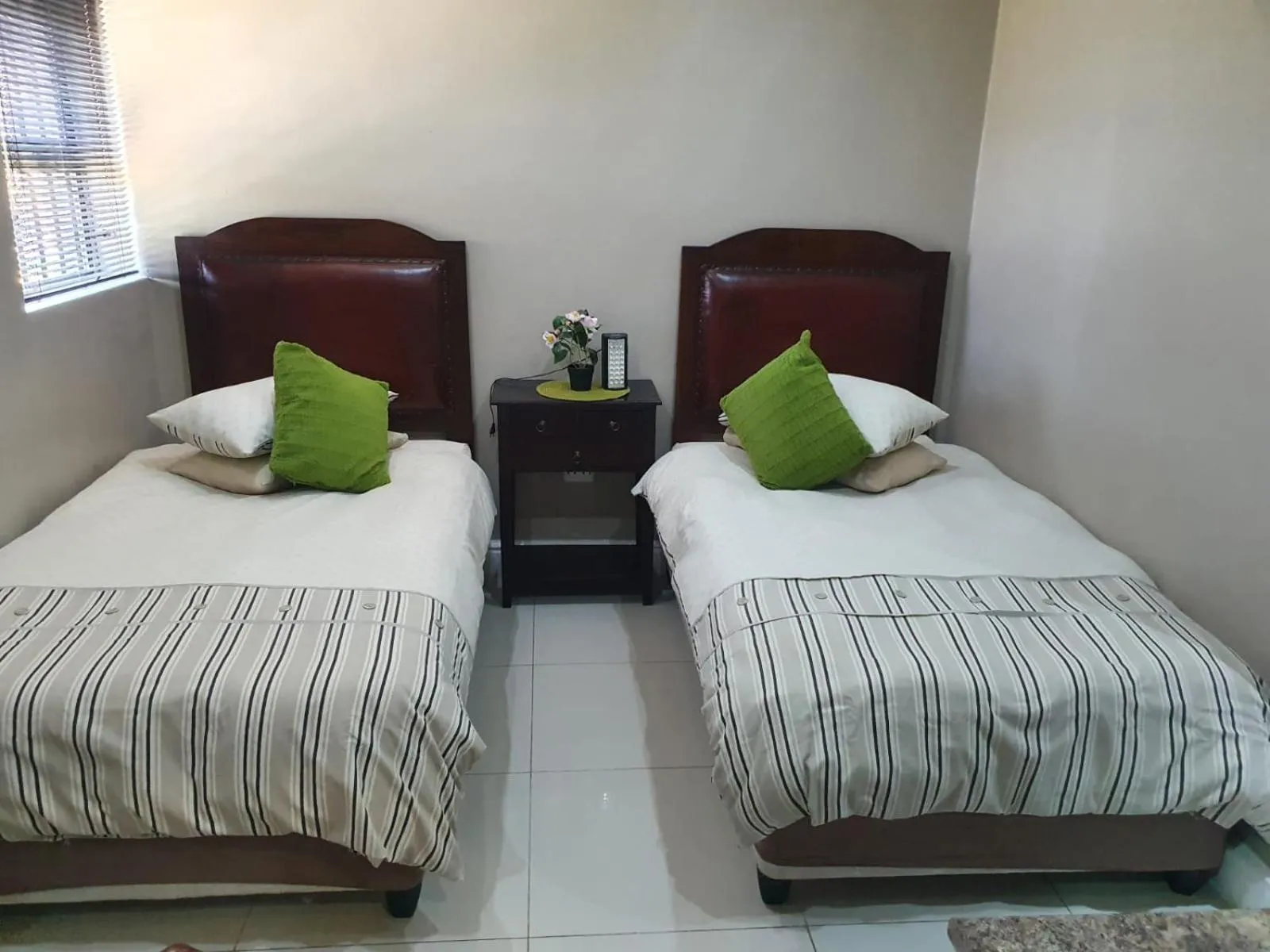 Bed in Mi Casa Guest House