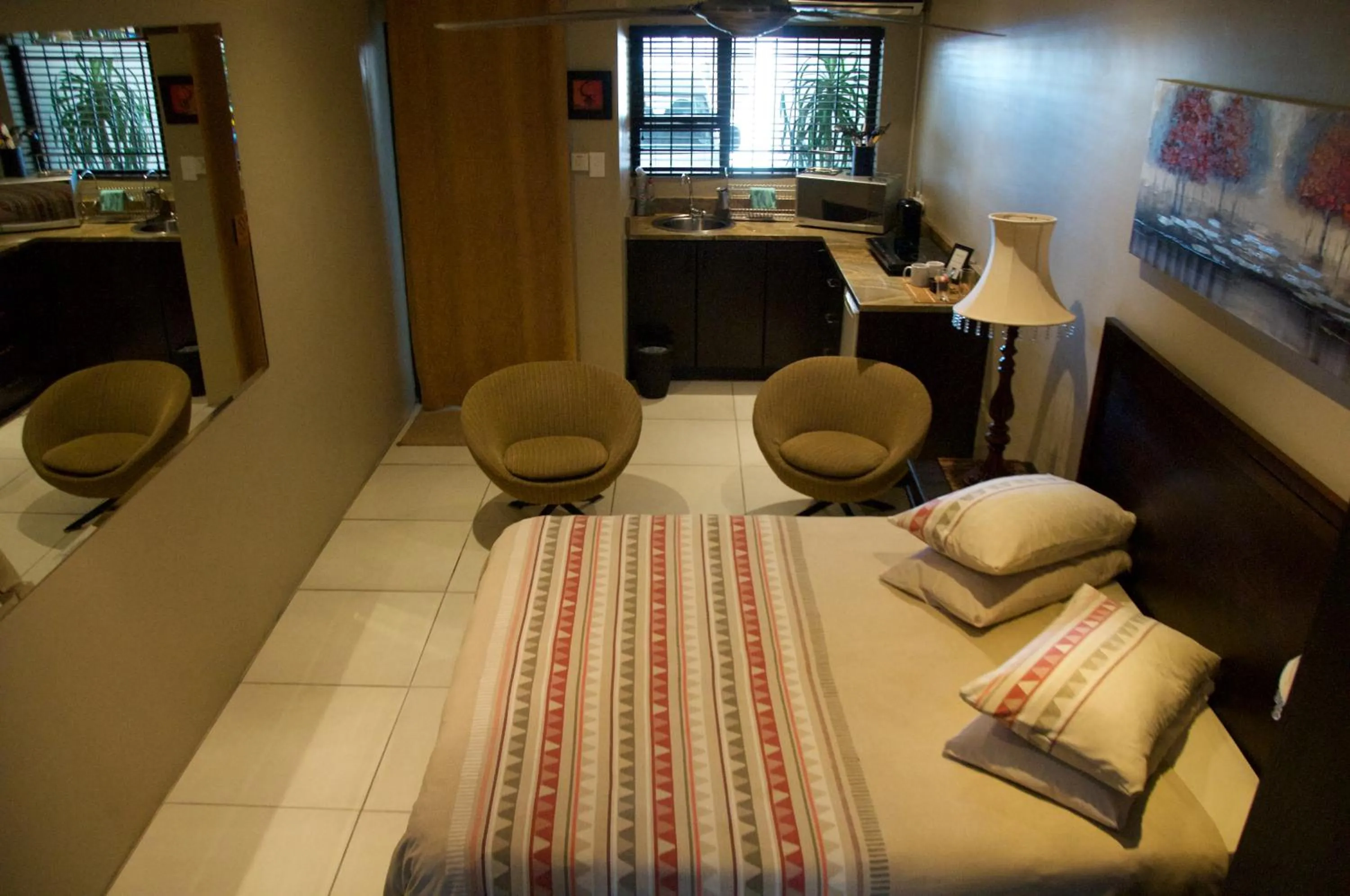 Bed in Mi Casa Guest House