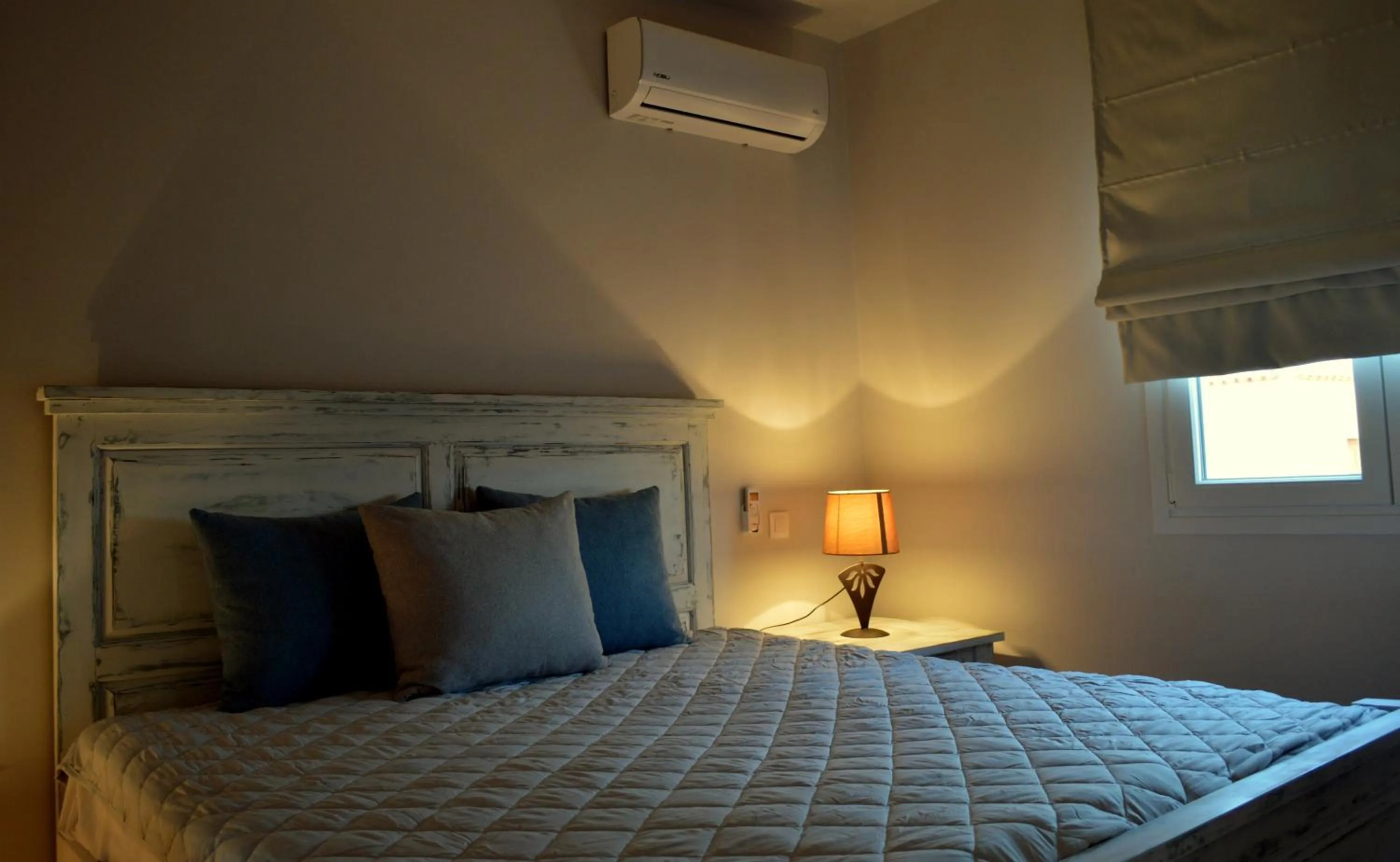 Bed in Ammos Luxury Suites