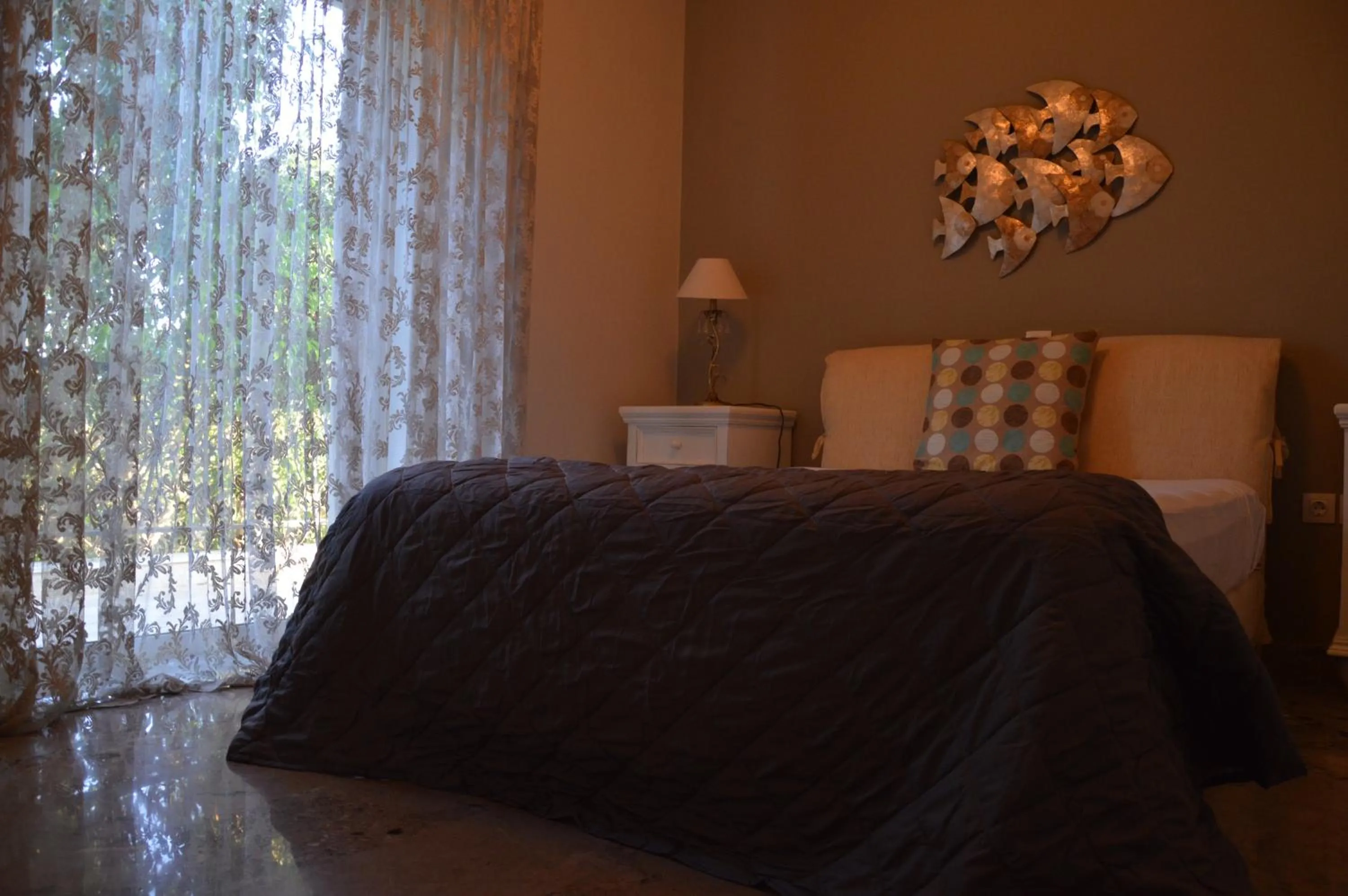 Bed in Ammos Luxury Suites